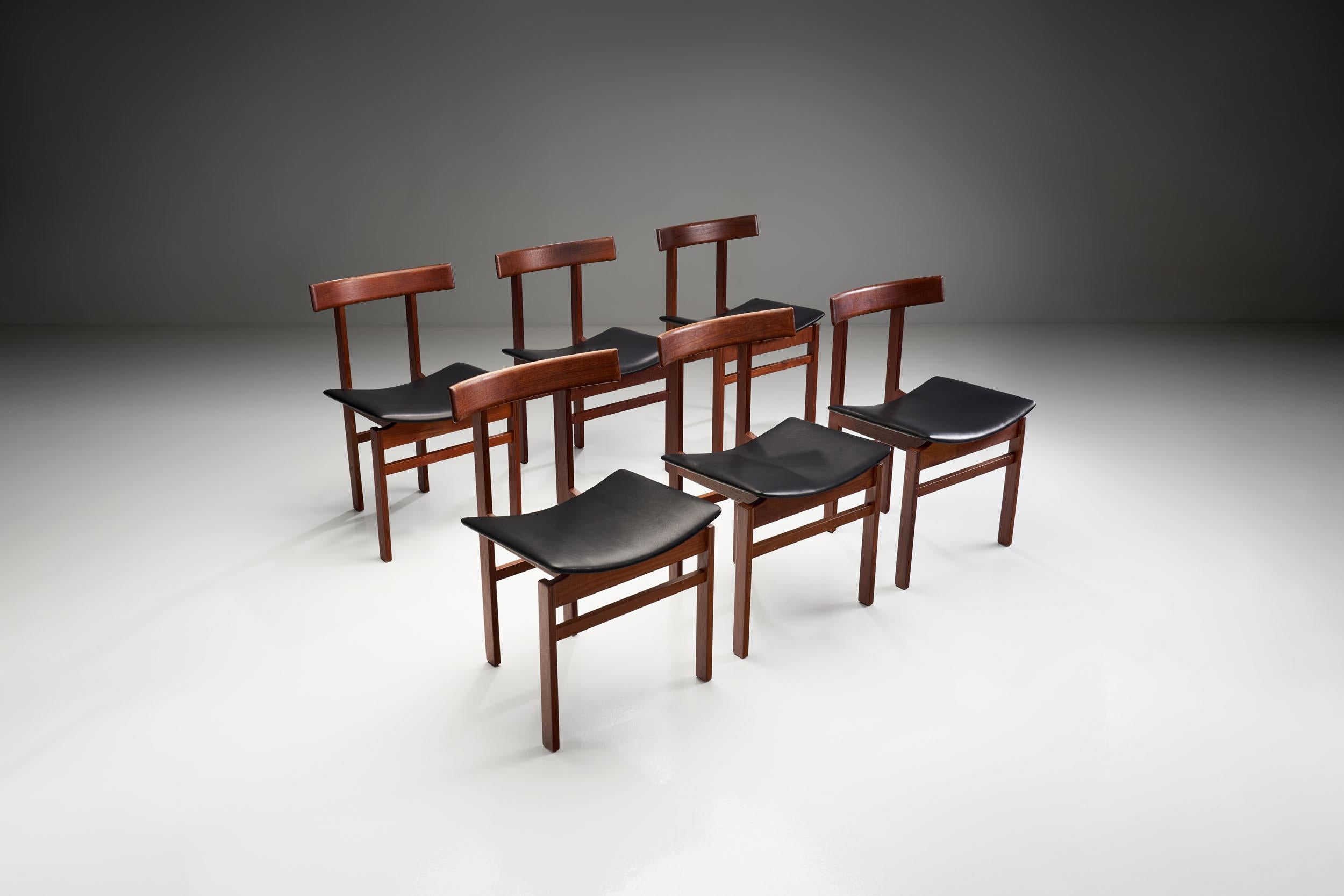 This fantastic set of 6 teak dining chairs in the Danish Modern style was designed by Inger Klingenberg for France and Son. The chairs feature a striking sculptural design and solid teak construction. 

The standout characteristic of these chairs
