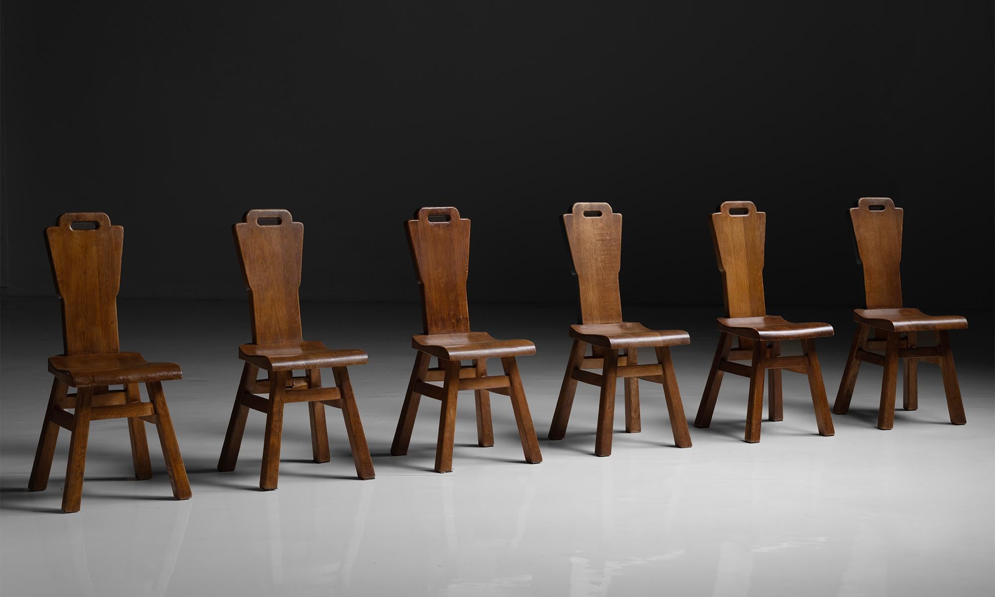 Set of (6) Monastery Chairs, Netherlands, circa 1900

Oak brutalist dining chairs from a Monastery in The Hague.

Measures 15”w x 17.5”d x 37.5”h x 18.5” seat.