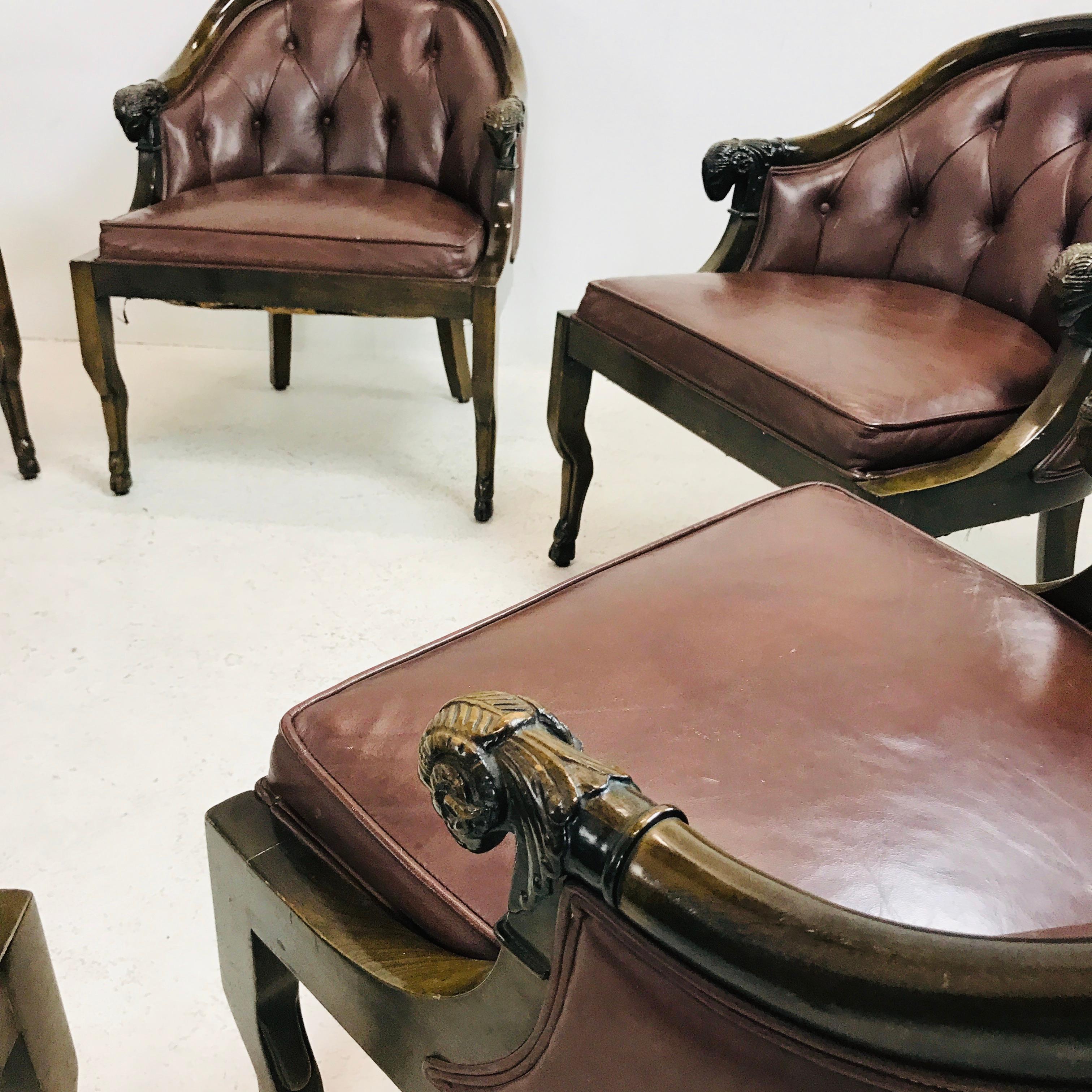 Set of 6 striking ram's head armchairs by Monteverdi-Young. These mahogany leather club chairs feature carved solid walnut ram heads at arms and cloven front feet.