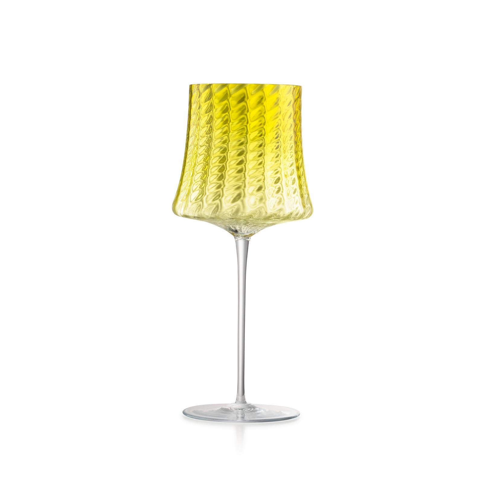 Crafted by the legendary Venetian glassmaker Salviati, this set of red wine glasses exemplifies the vibrant artistry and refined craftsmanship for which Murano glass is celebrated. Each piece is hand-blown in Murano, Venice, using time-honored