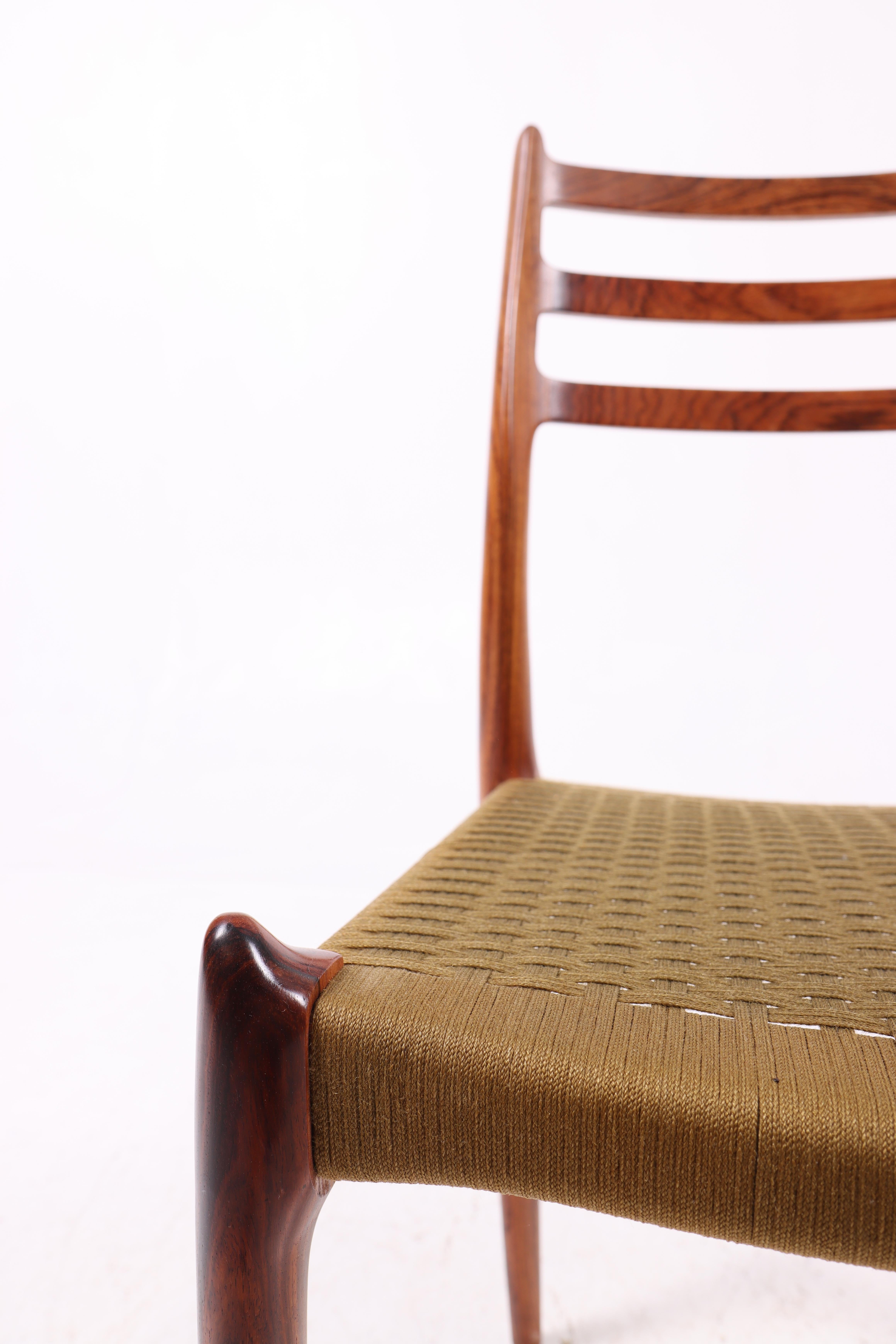 Scandinavian Modern Set of 6 N.O. Møller Dining Chairs, Model 78 in Rosewood with Paper Cord. For Sale