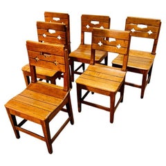 Set of 6 oak Folk Art Brutalist dining chairs.