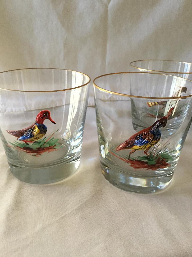 A scarce set of old fashion glasses with hand painted enamel birds and with a 3 dimensional look. These birds are actually built up on the glass to give this effect which can be seen in the photographs. There are several different types of game