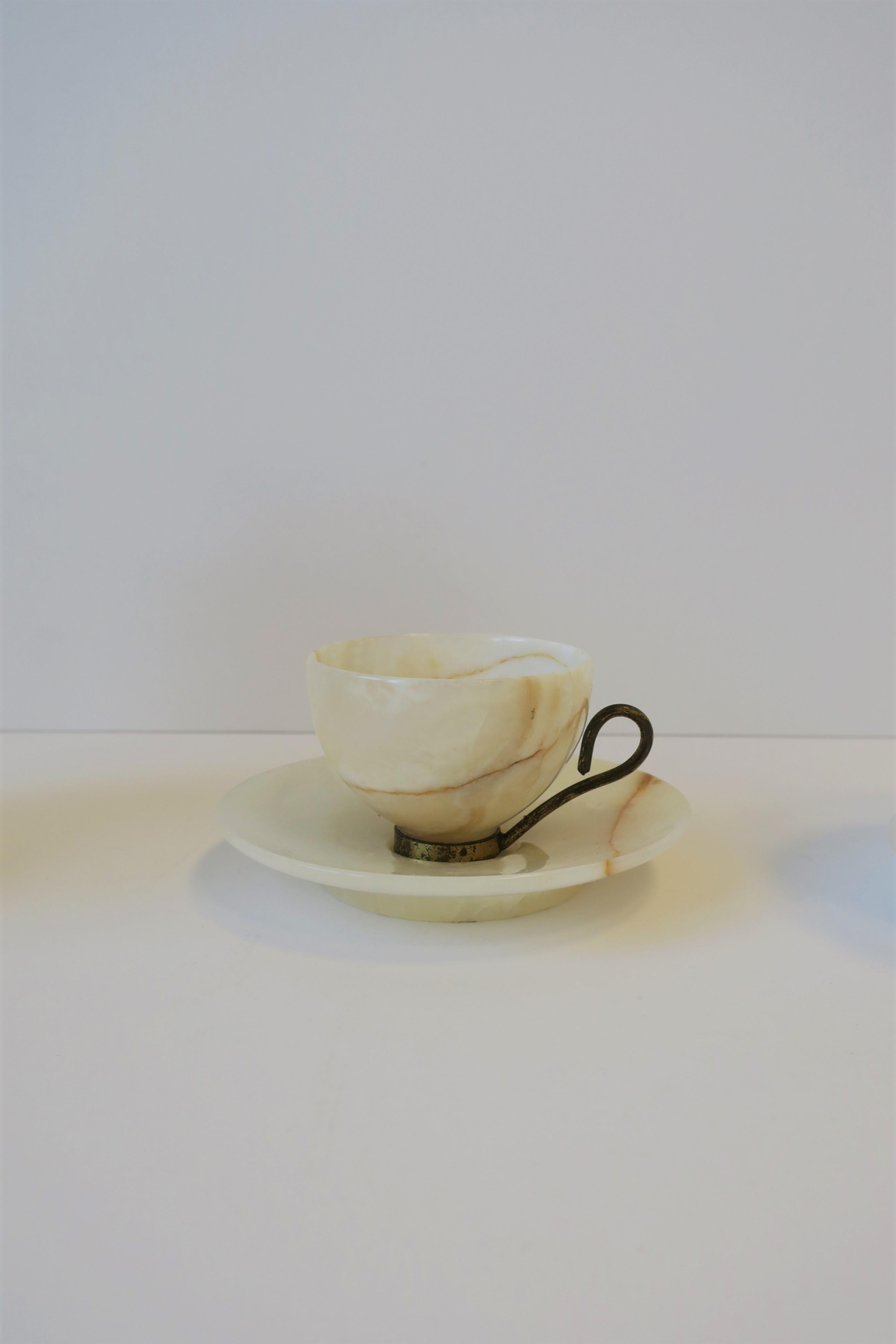 Onyx and Gold Gilt Coffee Cups and Saucers 1