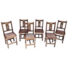 Ensemble de 6 chaises de style oriental en bois sculpté avec incrustation de nacre, 1880