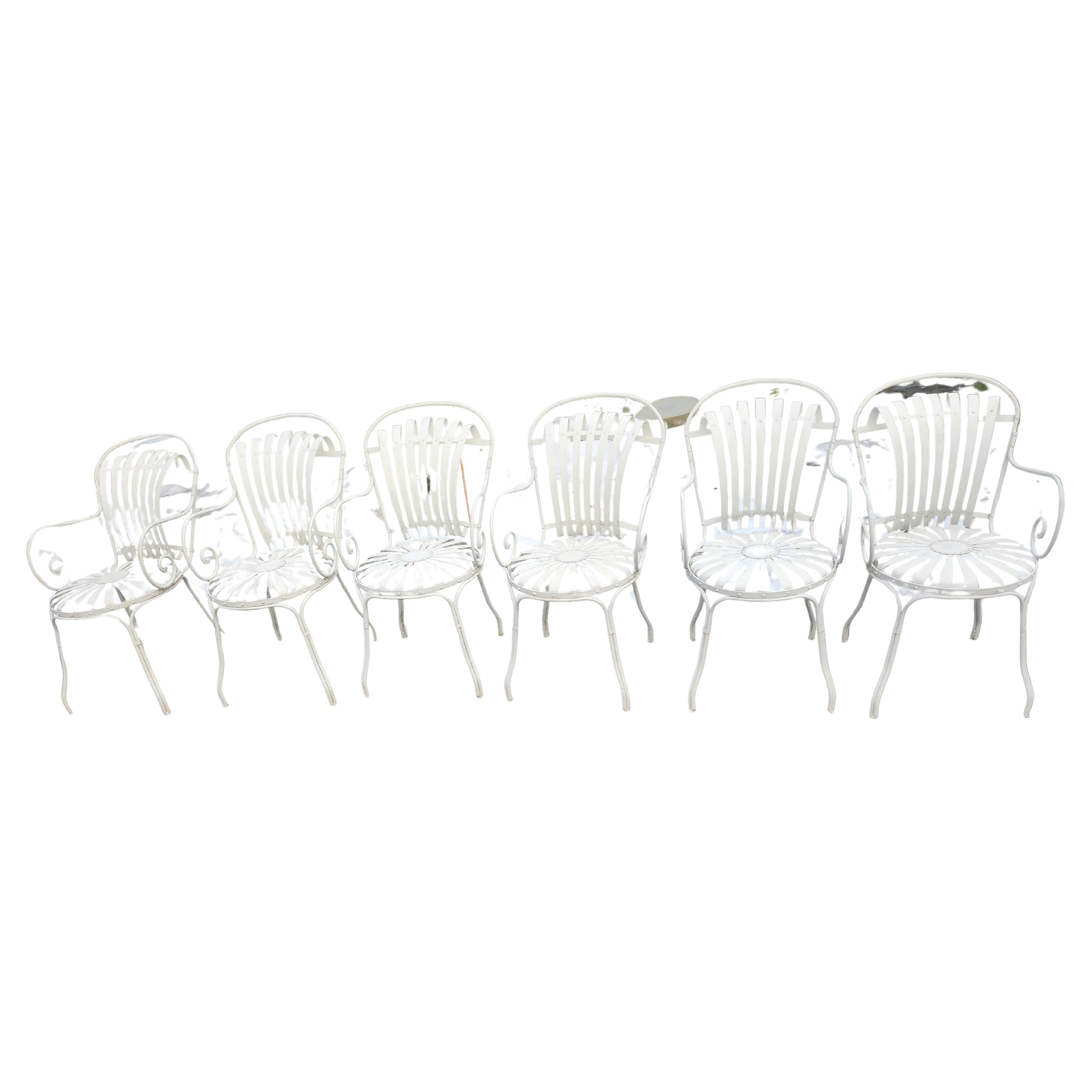 Fabulous elegant and in excellent vintage condition with minimal wear from age and use these Francous Carre sunburst spring garden dining chairs are ready to be set around youre table and enjoyed. Heavy duty steel and iron with riveted panels