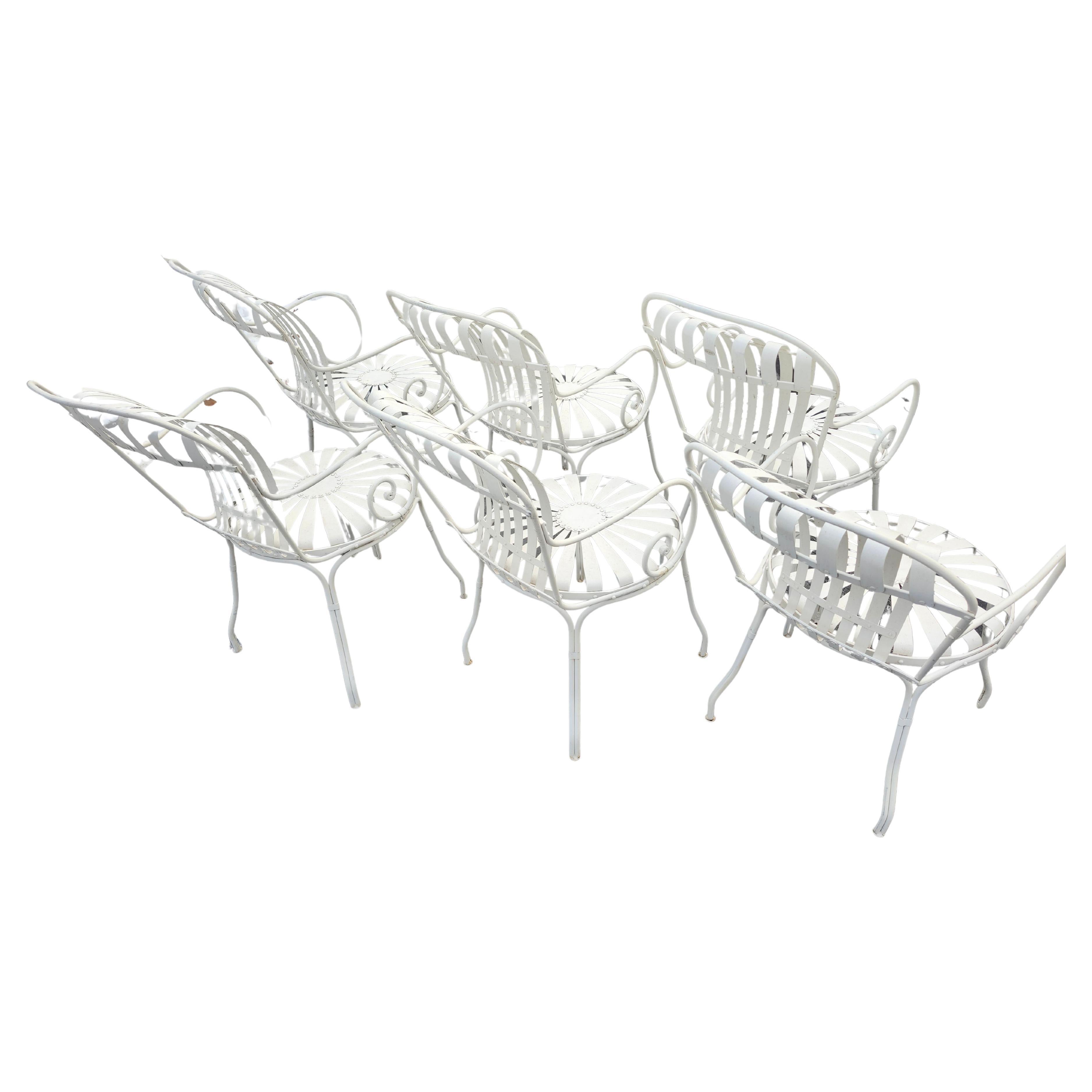 Neoclassical Set of 6 Outdoor Sunburst Spring Iron Garden Dining Arm Chairs by Francois Carre For Sale