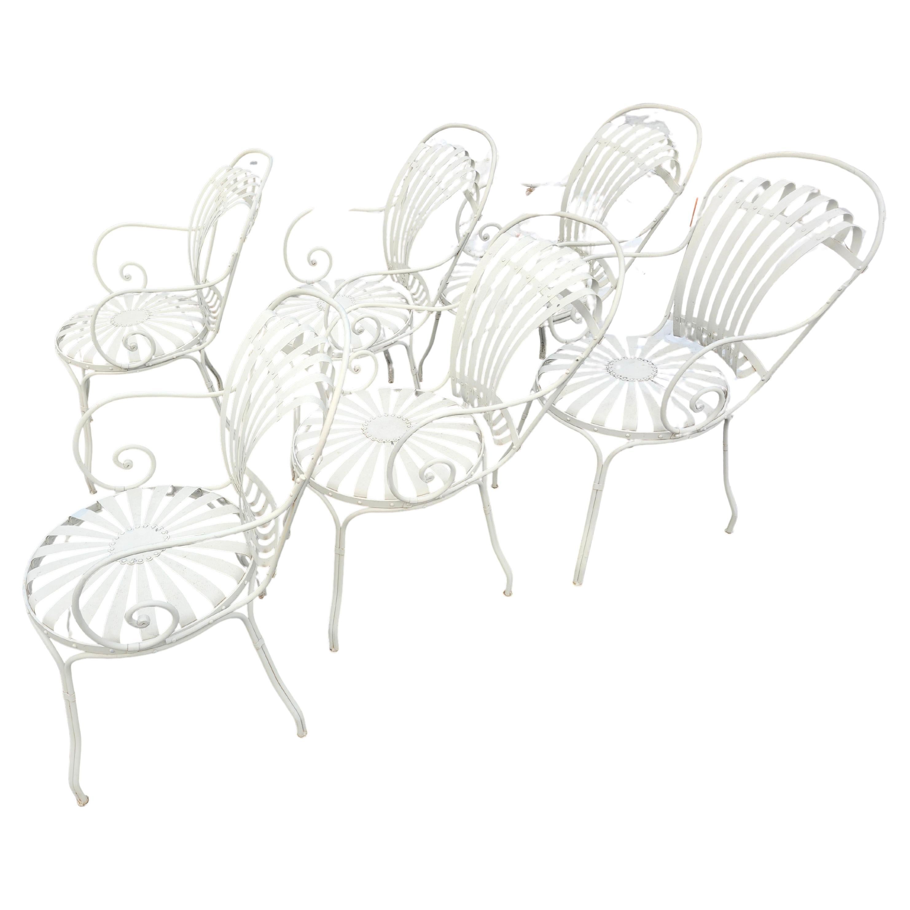 French Set of 6 Outdoor Sunburst Spring Iron Garden Dining Arm Chairs by Francois Carre For Sale