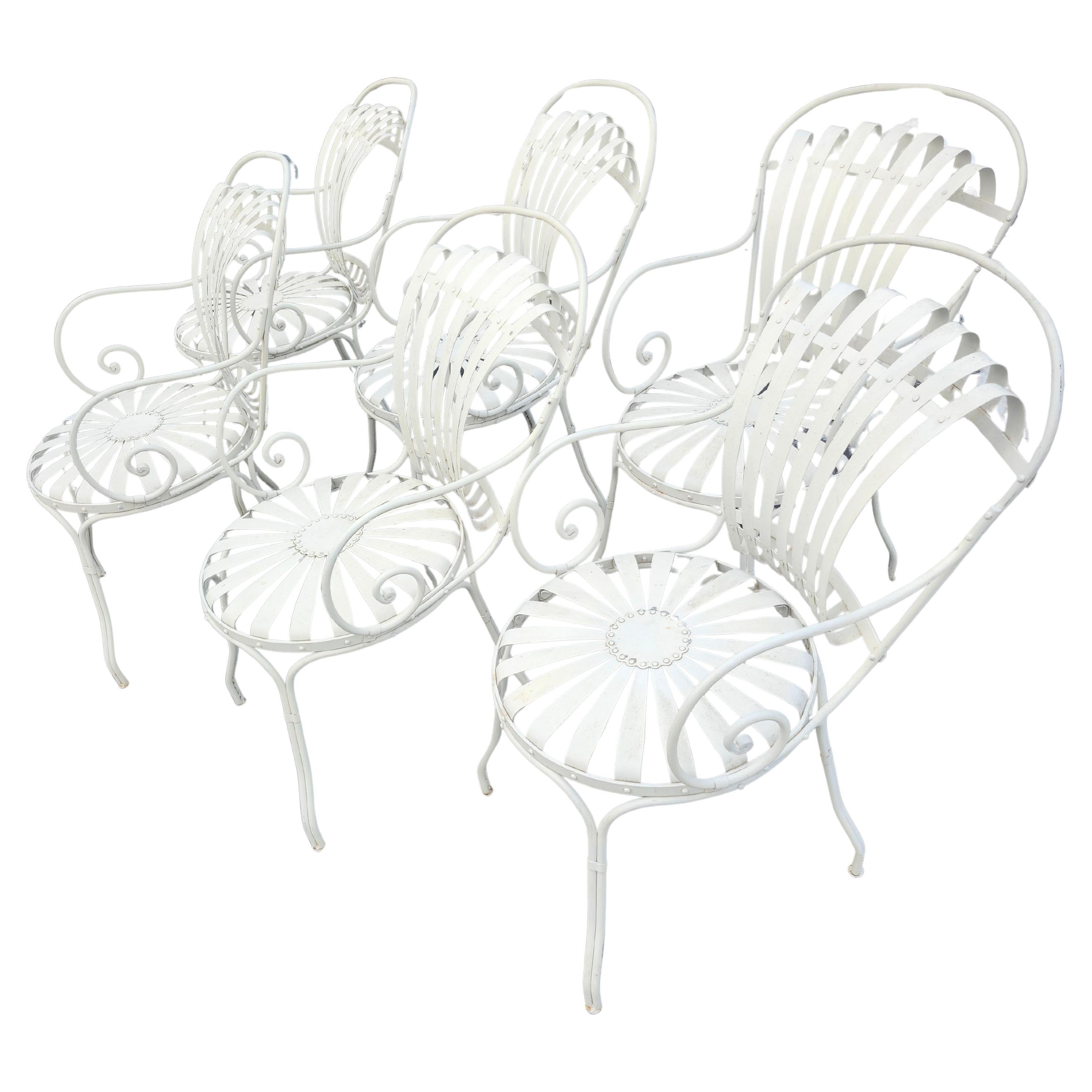 Hand-Crafted Set of 6 Outdoor Sunburst Spring Iron Garden Dining Arm Chairs by Francois Carre For Sale