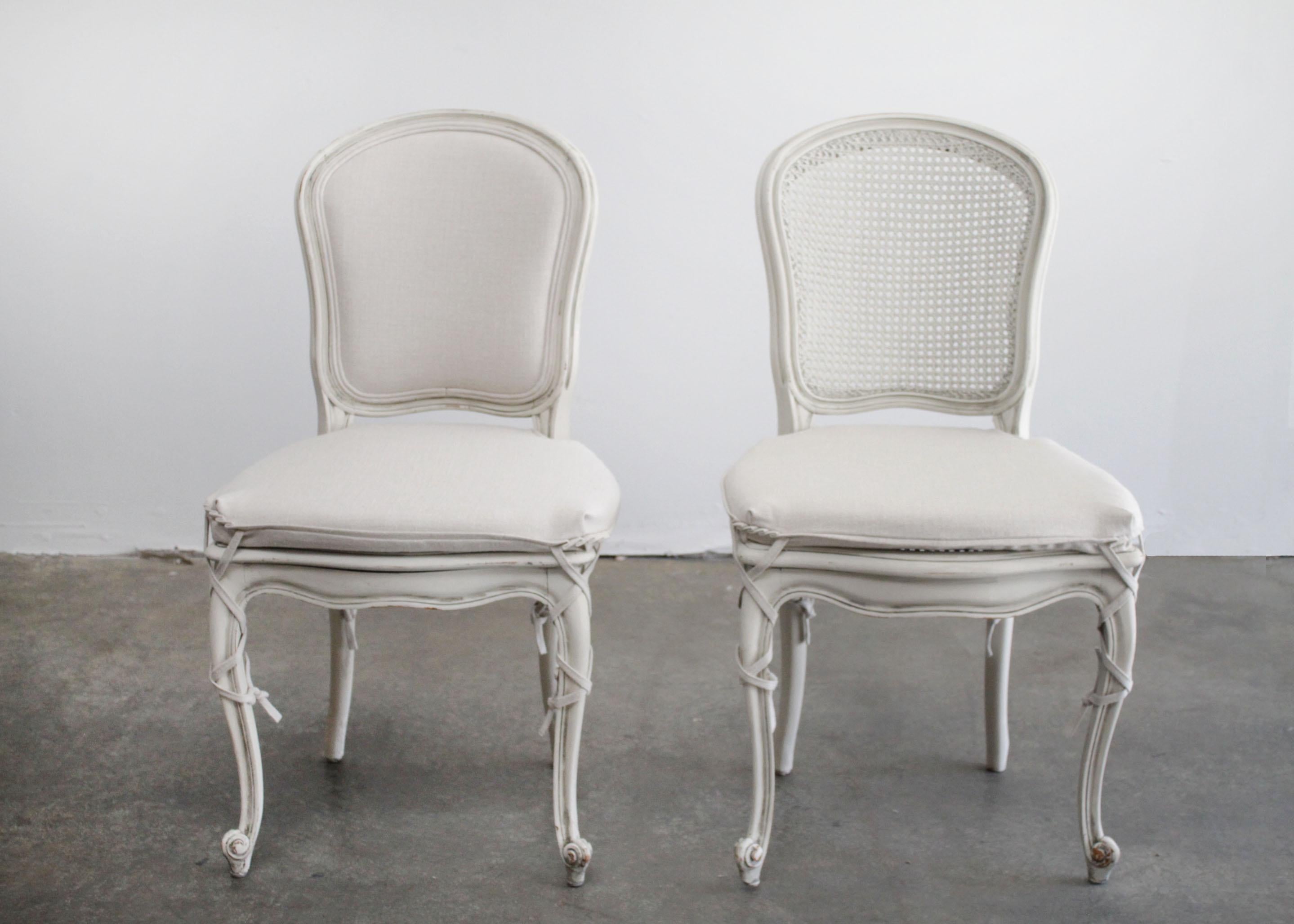 Set of 6 Painted and Upholstered Cane Back Dining Chairs with Slip Covers In Good Condition In Brea, CA