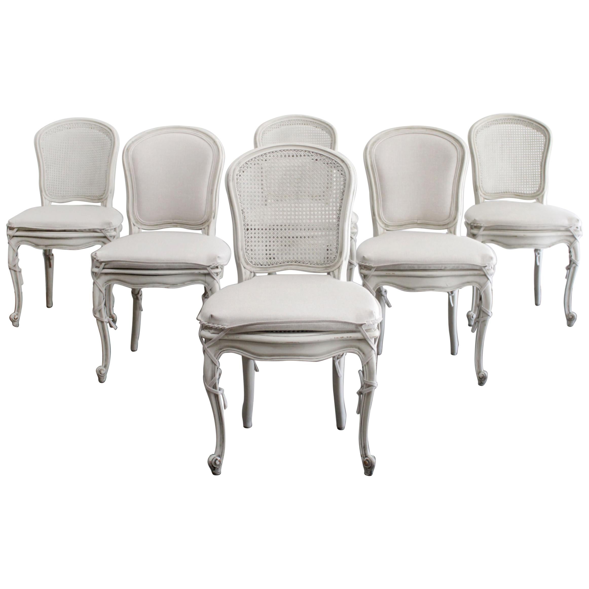 Set of 6 Painted and Upholstered Cane Back Dining Chairs with Slip Covers