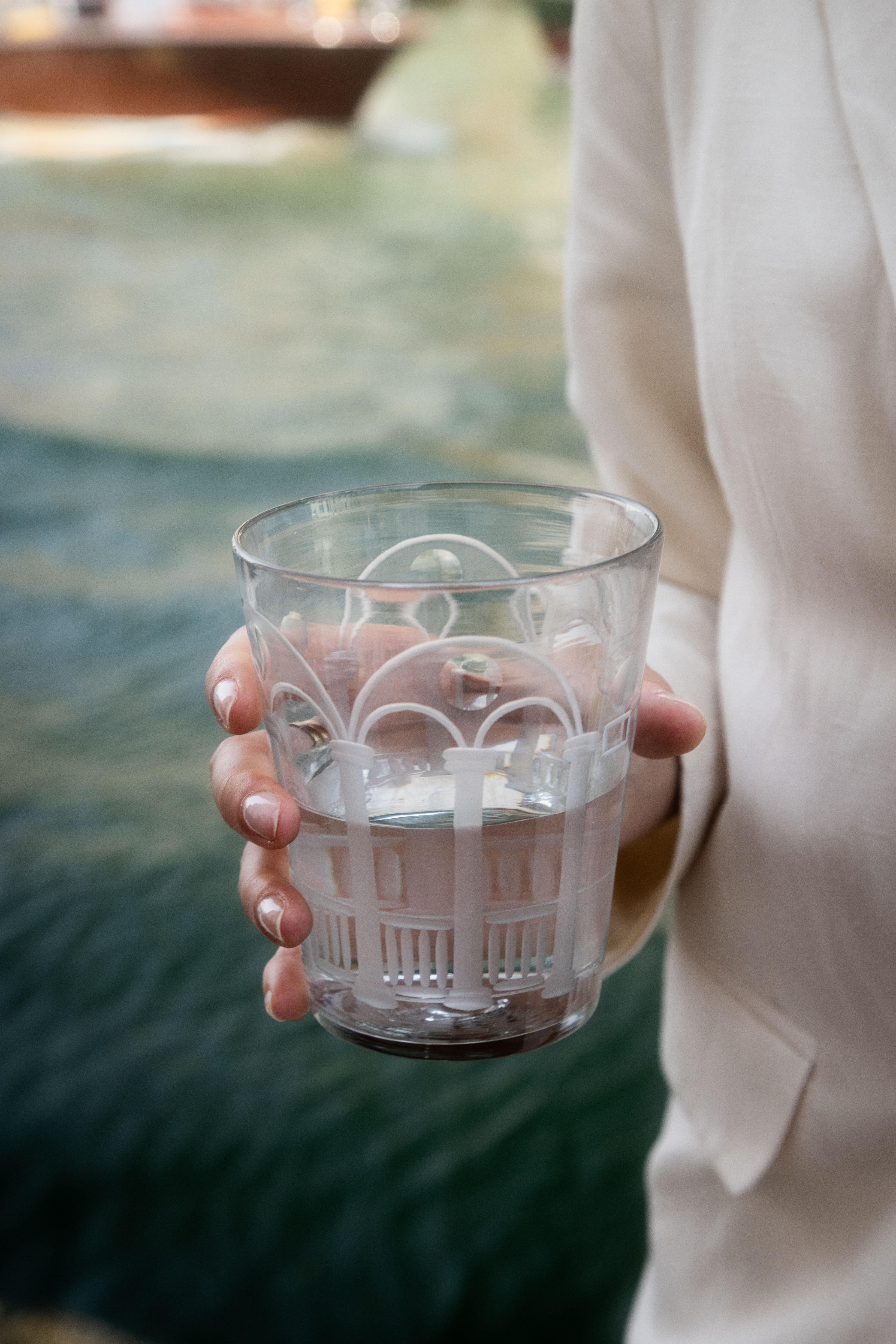 The Palazzo Glasses are crystal vessels engraved with the façades of Venice’s most iconic palazzos. The idea was born during a trip to Morocco, when Giberto Arrivabene Valenti Gonzaga, wandering through the labyrinthine souks of Marrakech, was