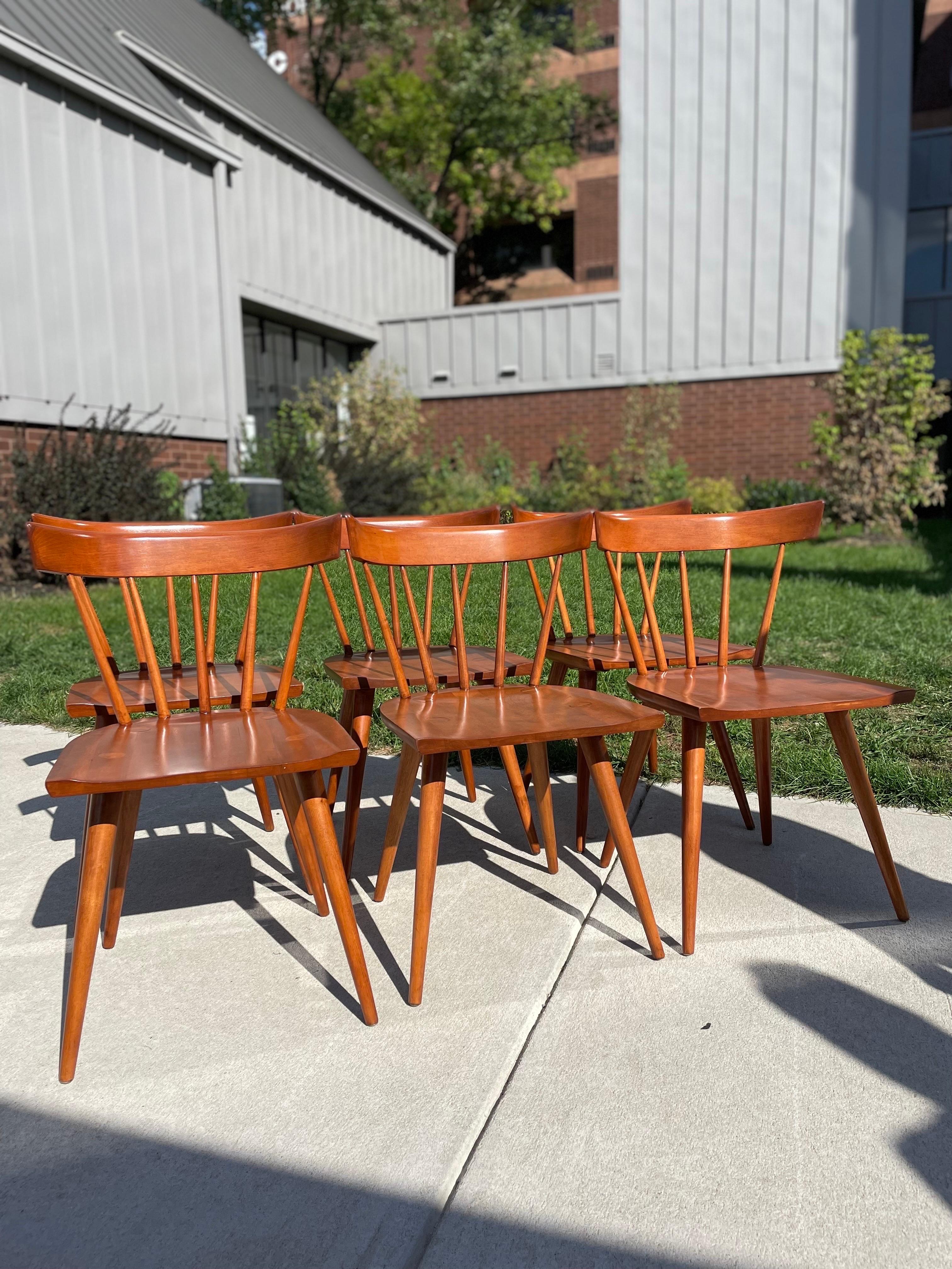 Set of 6 Paul McCobb planner group chairs. Newly refinished maple wood.