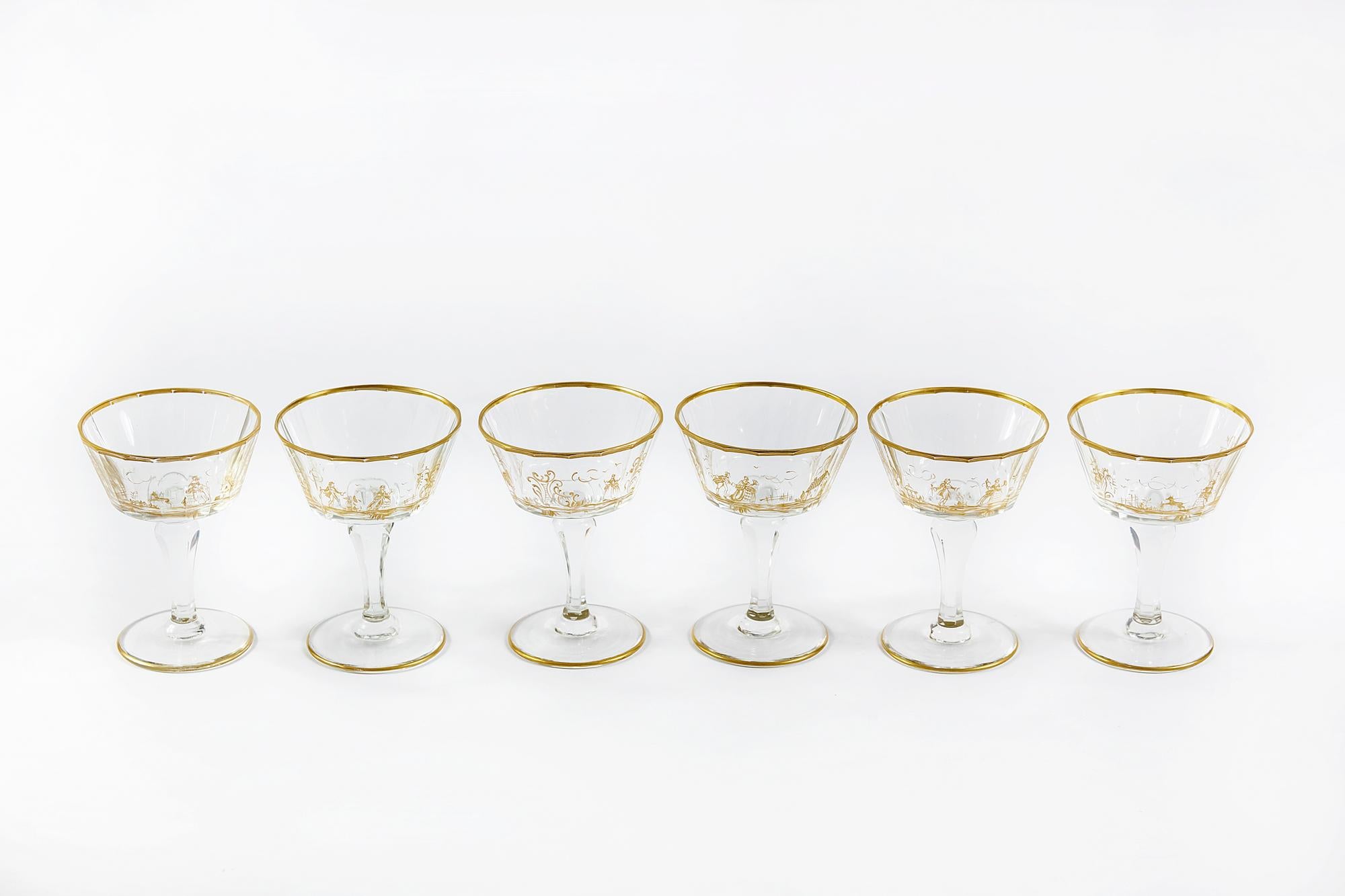 The set of 6 pieces. French champagne glasses from 19th century.
Each glass is faceted, hand painted with different scene and gilt trims through the glass.


         