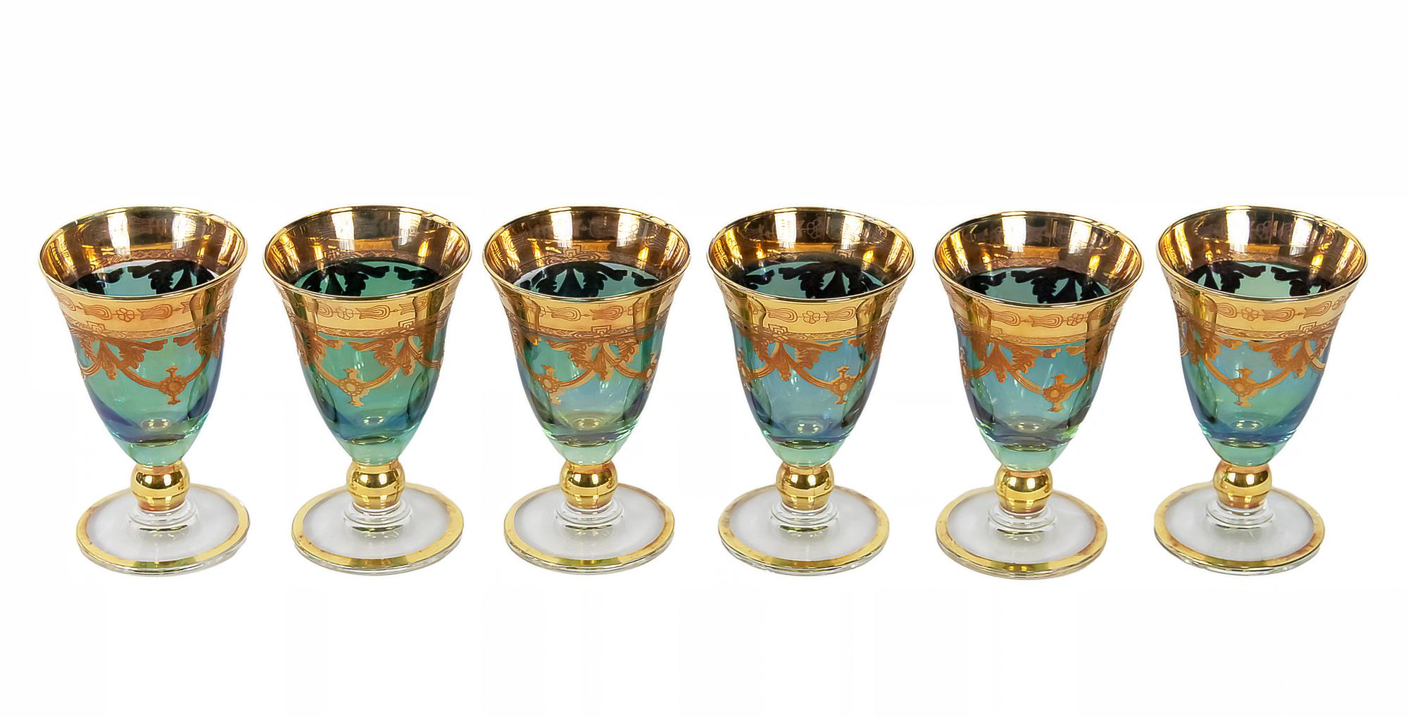 Set of 6 pcs. vintage Italian Arte Italica Medici wine/water glasses.
The glasses are created in mouth blown technique using blue/green colour glass and decorated with 24k gold decor.
Excellent vintage condition.

 