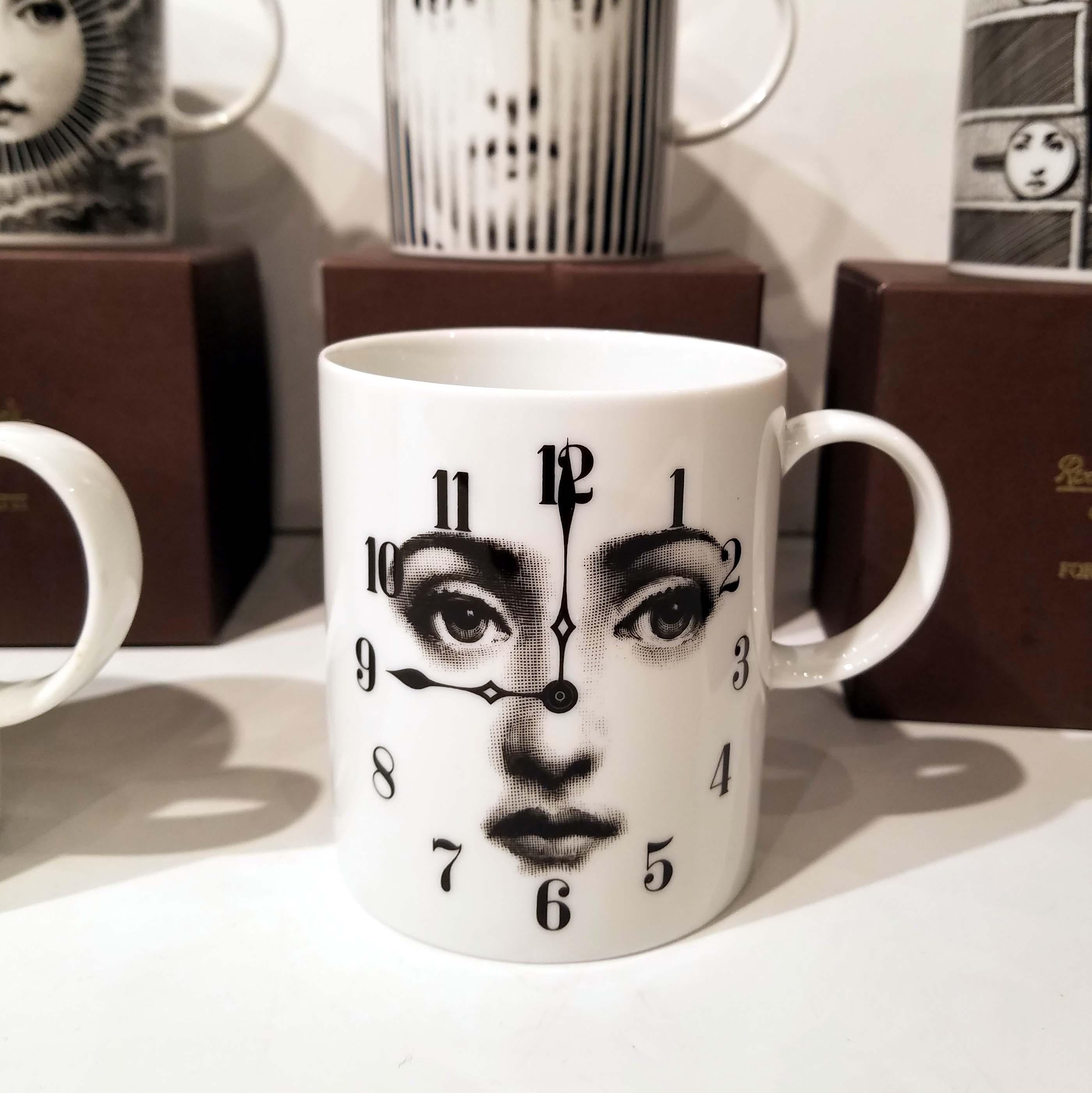 This set of 6 Piero Fornasetti serigraphed transfer porcelain coffee or tea mugs for Rosenthal Classic Germany are from the 1980s. They come in their original boxes. They are from the Julia Collection of Lina Cavalieri. It is hallmarked on the