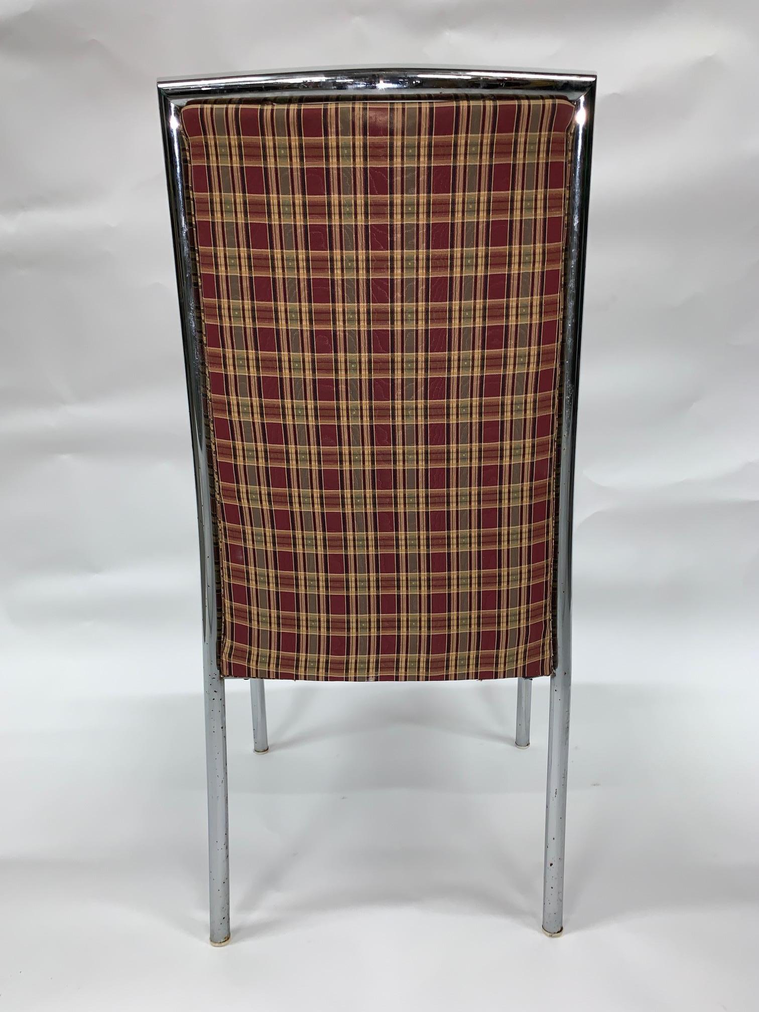 6 beautiful Pierre Cardin chrome dining chairs with plaid fabric. Great sculpture frames that gives it a very sophisticated look.