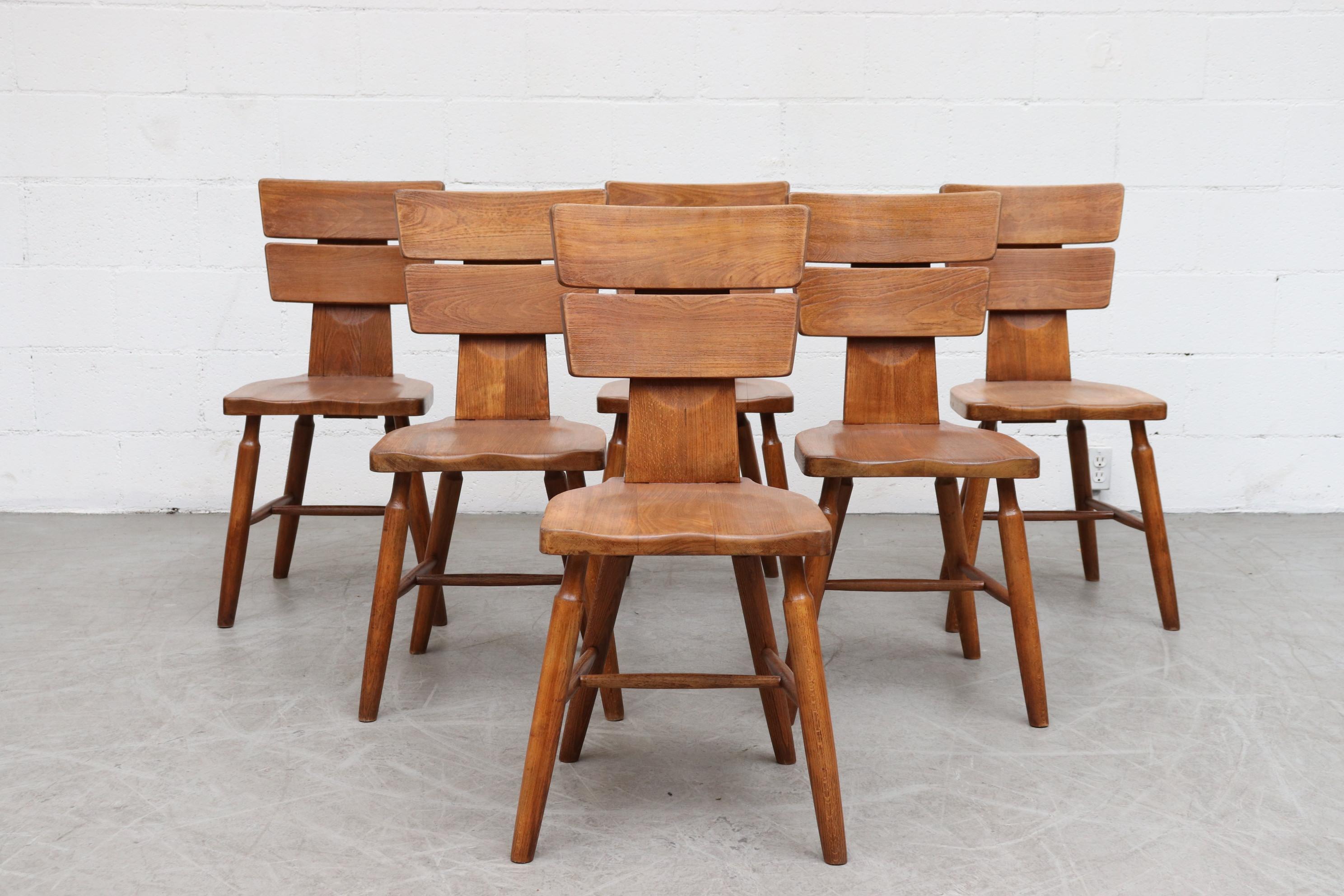Set of 6 Brutalist dining chairs with horizontal linear detail. Lightly refinished. In original condition with some visible signs of wear consistent with age and use. Set price.