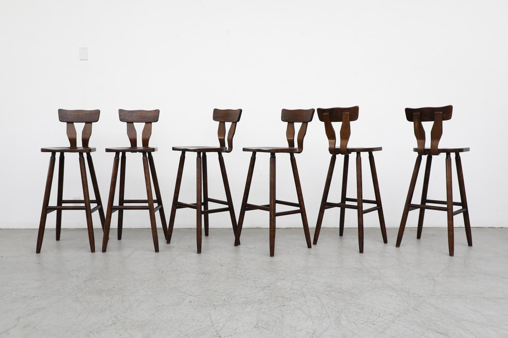 Set of 6 Pierre Chapo inspired T-back dark stained oak bar stools with tapered legs. In original condition with visible signs of use including some wear, consistent with their age and use. Similar set also available and listed separately. Set price.