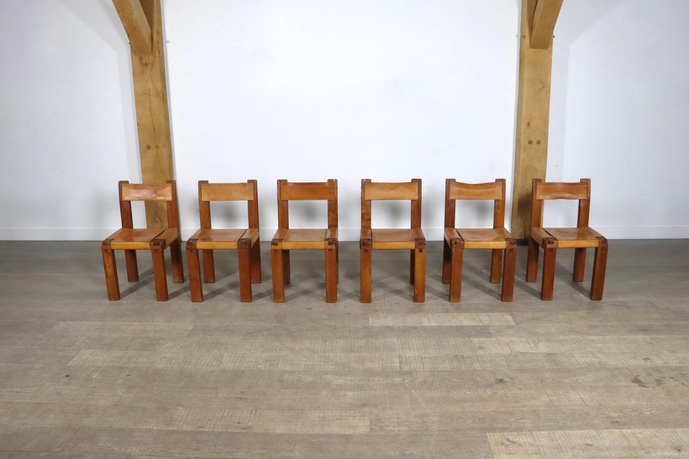 
Incredible set of 6 model S11 dining chairs by the French designer Pierre Chapo. The absolutely stunning design with the iconic Chapo trademark wood joints which were created as a result of the pioneering 48 x 72 assembly ratio. The thick cognac
