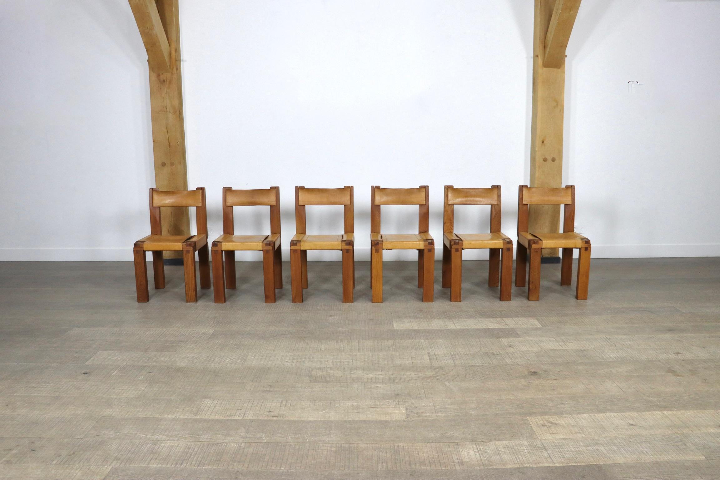 Incredible set of 6 model S11 dining chairs by the French designer Pierre Chapo. The absolutely stunning design with the iconic Chapo trademark wood joints which were created as a result of the pioneering 48 x 72 assembly ratio. The thick cognac
