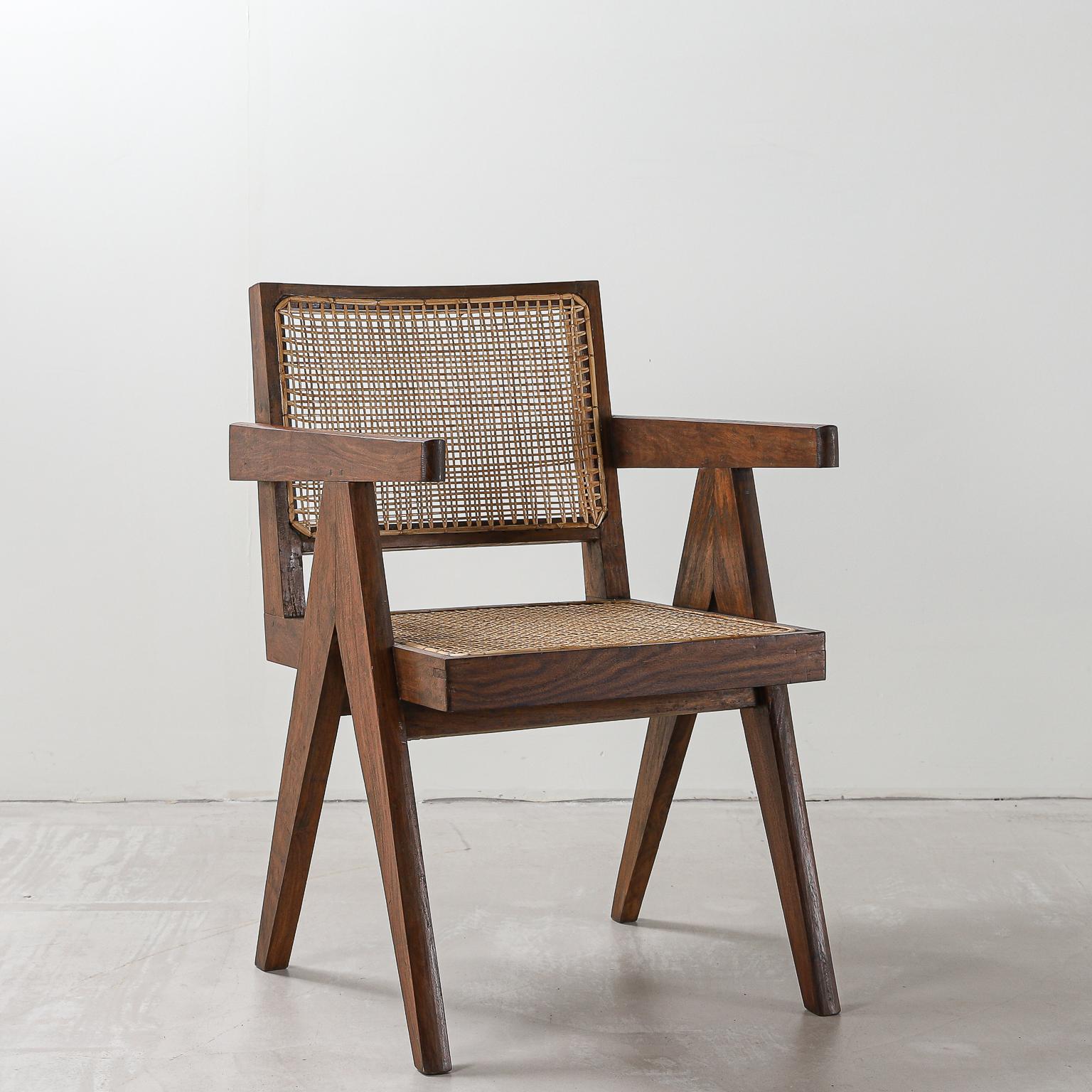 Pierre Jeanneret office chair, variant, circa 1953-1954. Model number PJ-SI-28-D

Teak and rattan. Intended for: various administrative buildings, Chandigarh, India.

Photos of original state to show authenticity available on request. 

Pierre