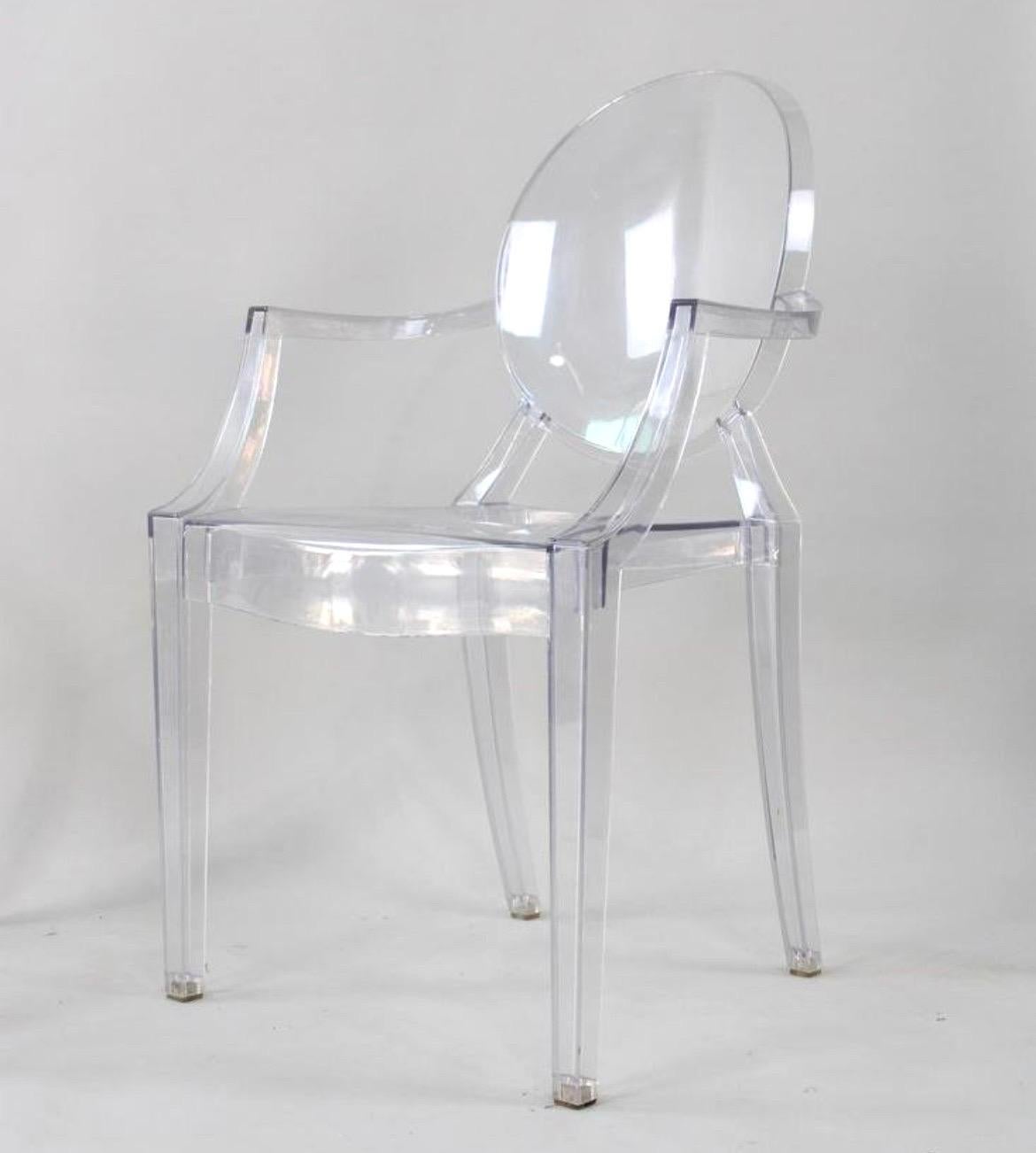 Set of 6 fantastic post modern, clear acrylic ghost chairs. They have curved armrests and straight front legs and saber back legs. Seat back is a circle. They stack easily.
Modern take of the classic Louis XVI armchair.
Suitable for indoor or