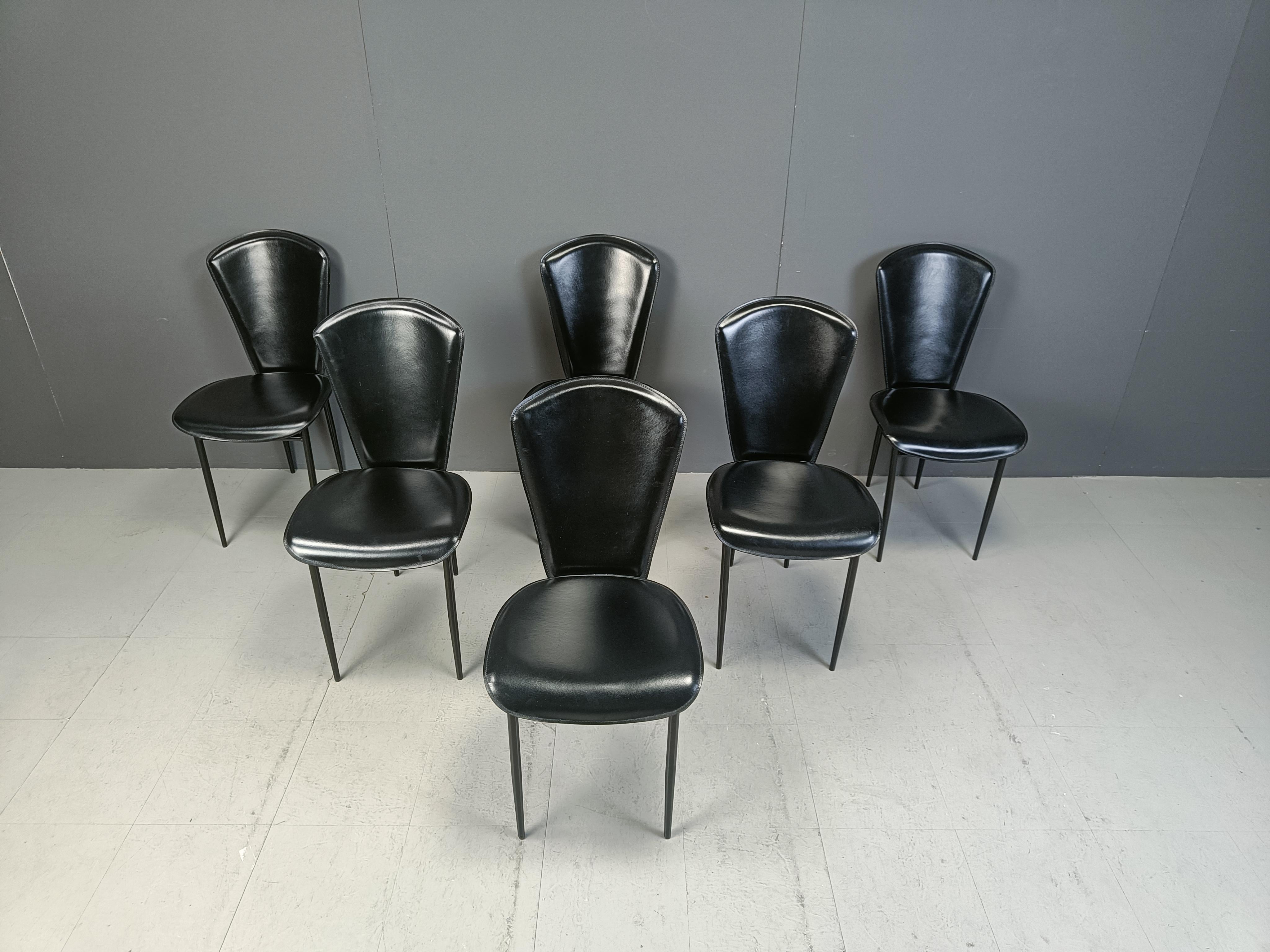 Elegant post modern italian design dining chairs with black skai upholstery on a black metal frame.

Timeless design chairs in very good condition.

Dimensions:
Height: 90cm
Width: 43cm
Depth: 47cm
Seat h eight: 45cm

Price is for the set.

Ref.:
