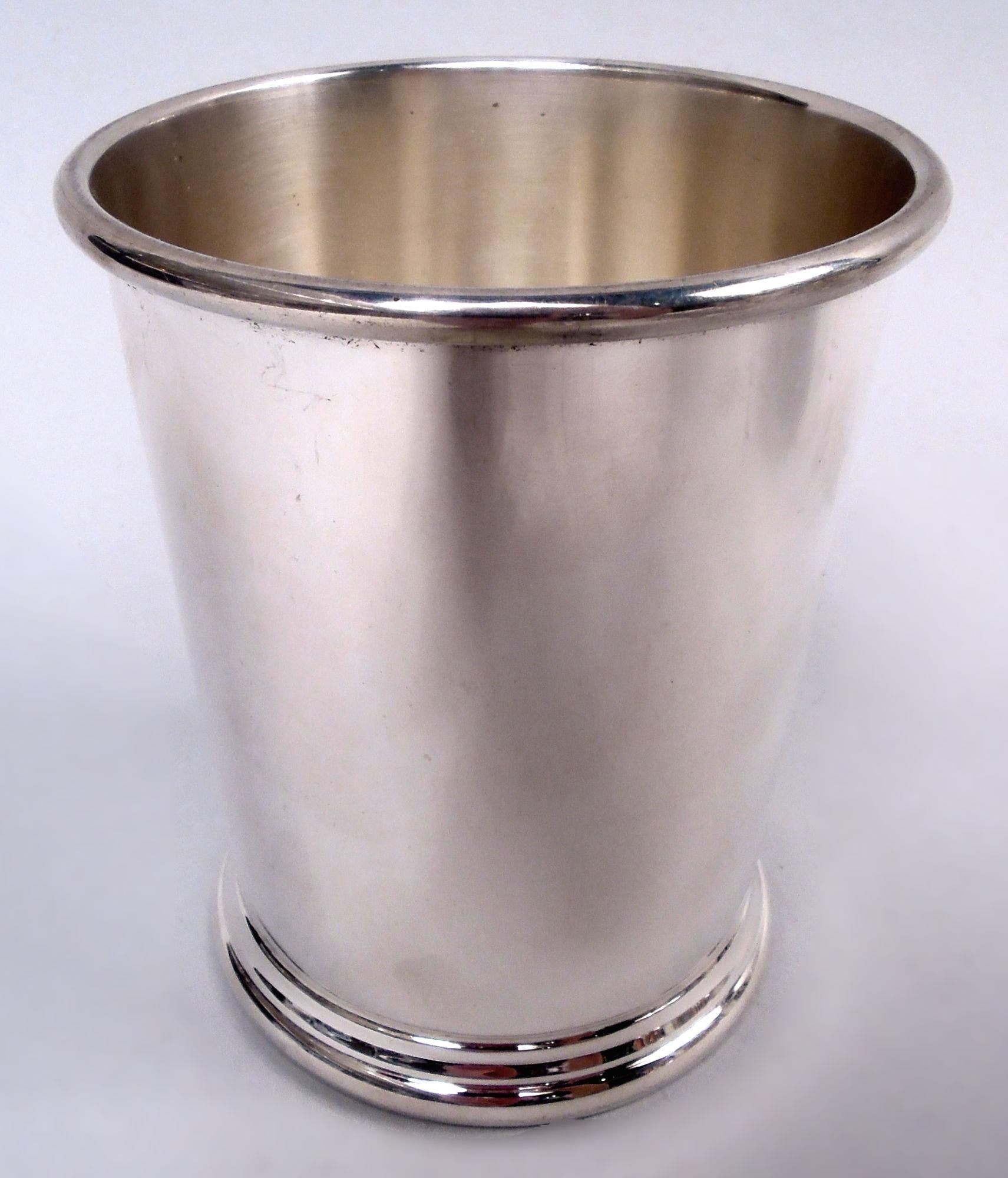 Set of 6 sterling silver mint julep cups. Made by Preisner Silver Company in Connecticut. Each: Straight and tapering sides, molded rim, and skirted foot. Marked “Preisner / Sterling / 140”. Total weight: 27.5 troy ounces. 
