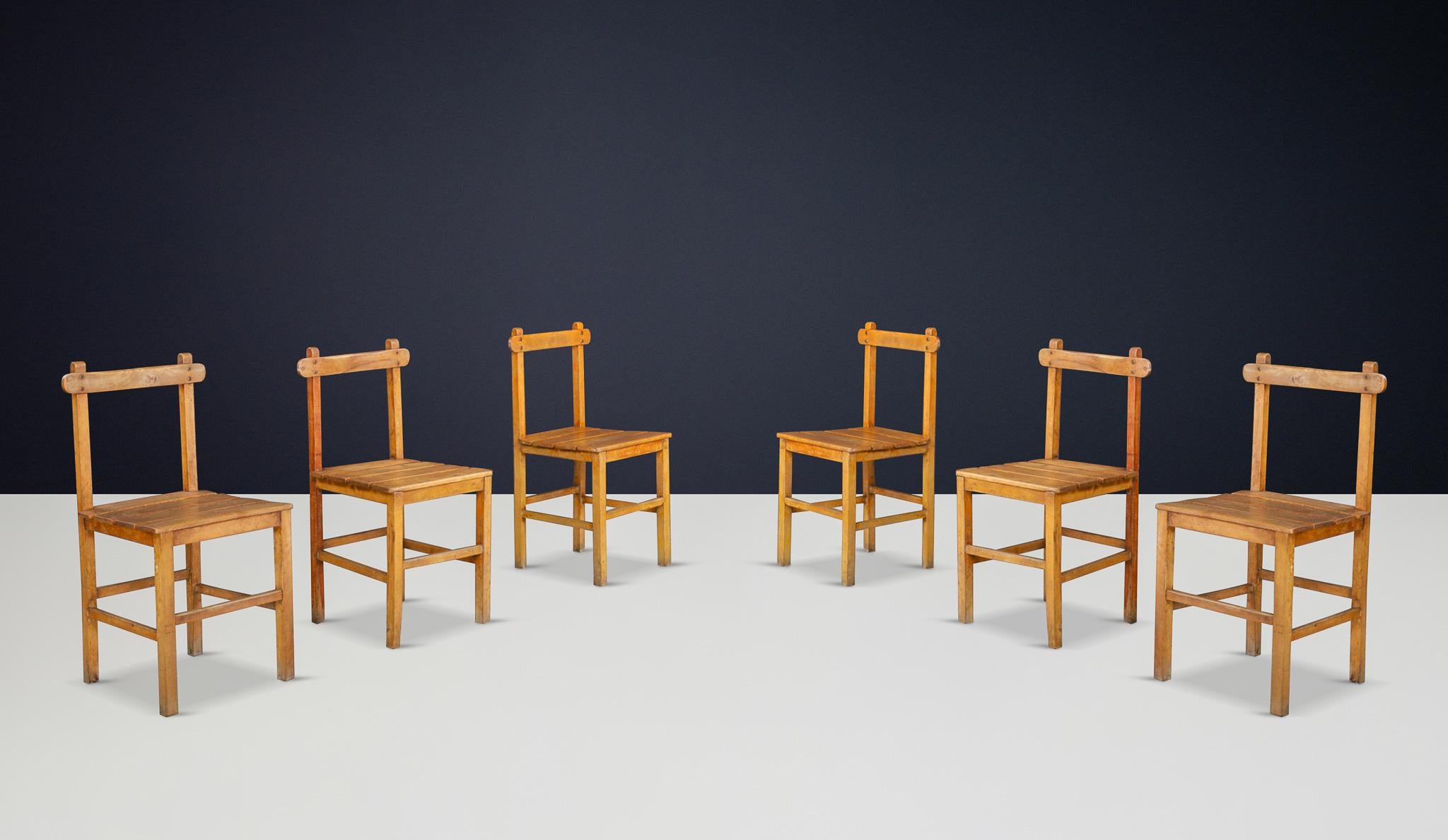 Set of 6 Primitive Beech Dining Chairs, France, 1950s

This charming set of six primitive dining chairs originates from France and dates back to the 1950s. Crafted from solid beech wood, these chairs showcase a raw, honest aesthetic that emphasizes