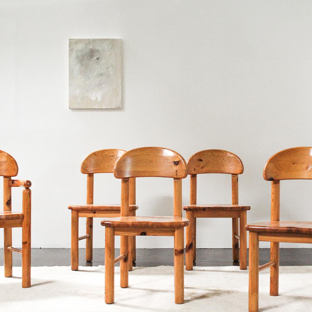 A set of six 1970s pine dining chairs by Rainer Daumiller for Hirtshals Savvaerk, Denmark. A simple yet organic design with a circular seat that gives attention to the natural expression of the grain and pine. “Solid in construction, simple in form,