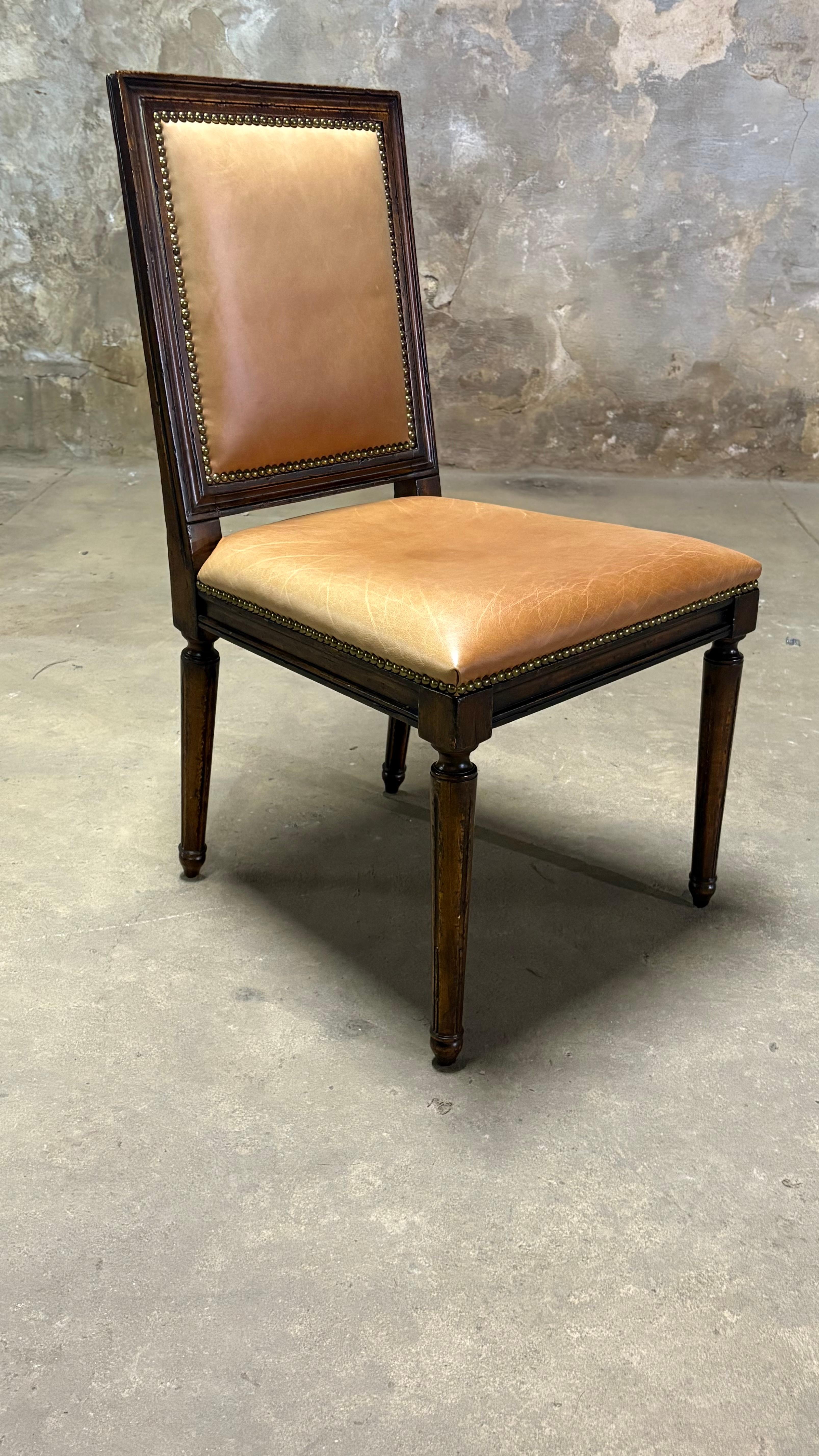 Beautiful set of six dining chairs. 

They were manufactured by Ralph Lauren for Henredon and were part of a special series. 

They are all in great condition, and have a tan/brown leather upholster with brass nailheads. They have a French Louis XVI