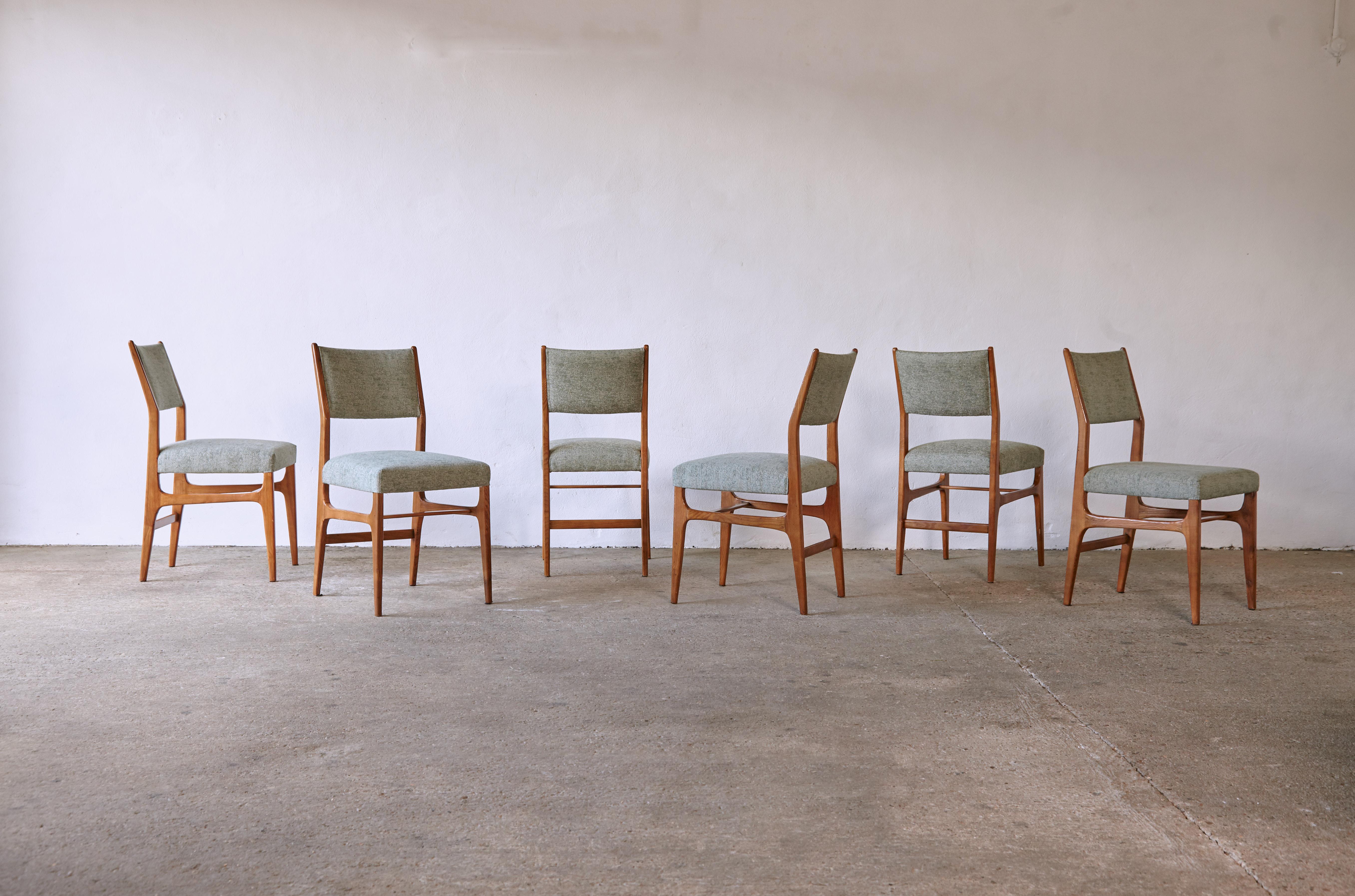 A beautiful and rare set of six model 602 dining chairs designed by Gio Ponti for Cassina, Italy, 1950s. Walnut frames and later muted green upholstery. Good vintage condition - the wooden frames show signs of use and wear relative to