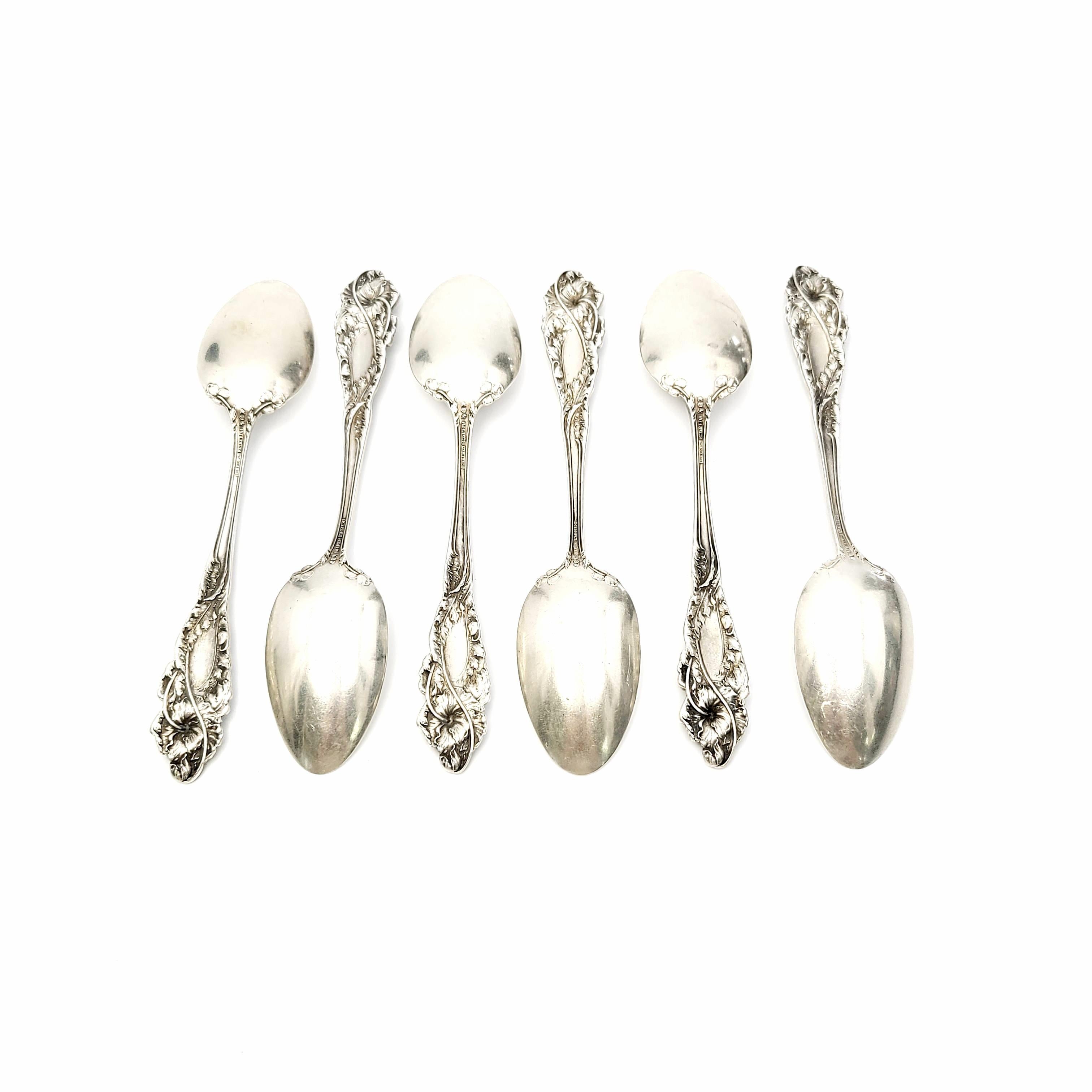Set of 6 antique sterling silver youth spoons by Reed & Barton in the love disarmed pattern.

No monogram.

Reed & Barton's love disarmed pattern is a highly sought out and collectible pattern issued 1899-1928 designed by Charles A Bennett.