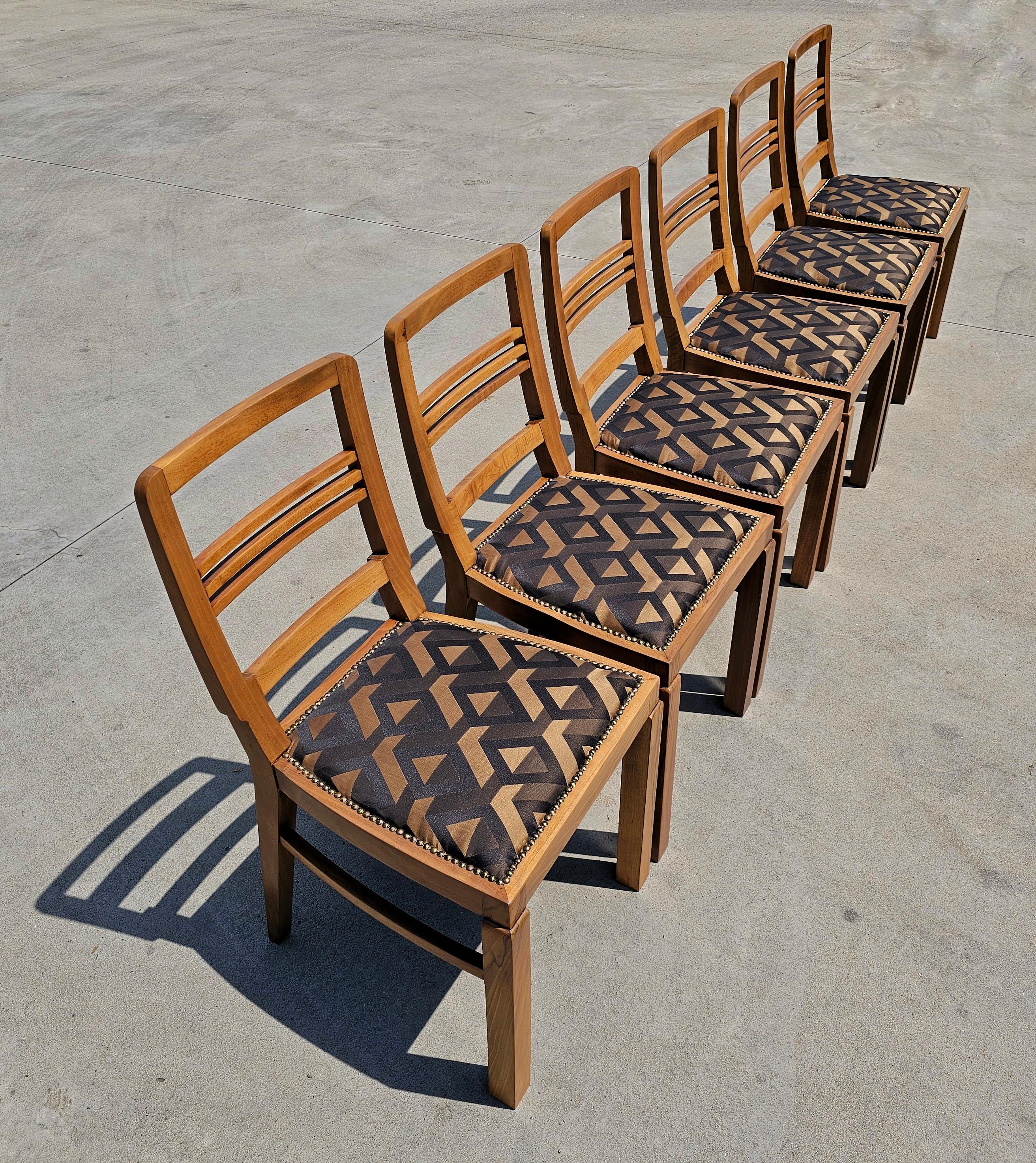 In this listing you will find a set of 6 beautiful Art Deco Dining chairs made in style of Koloman Moser. Walnut roots veneer in the front of the frames and the backrest give these chairs a note of luxury. Solid walnut frame and legs. Recently