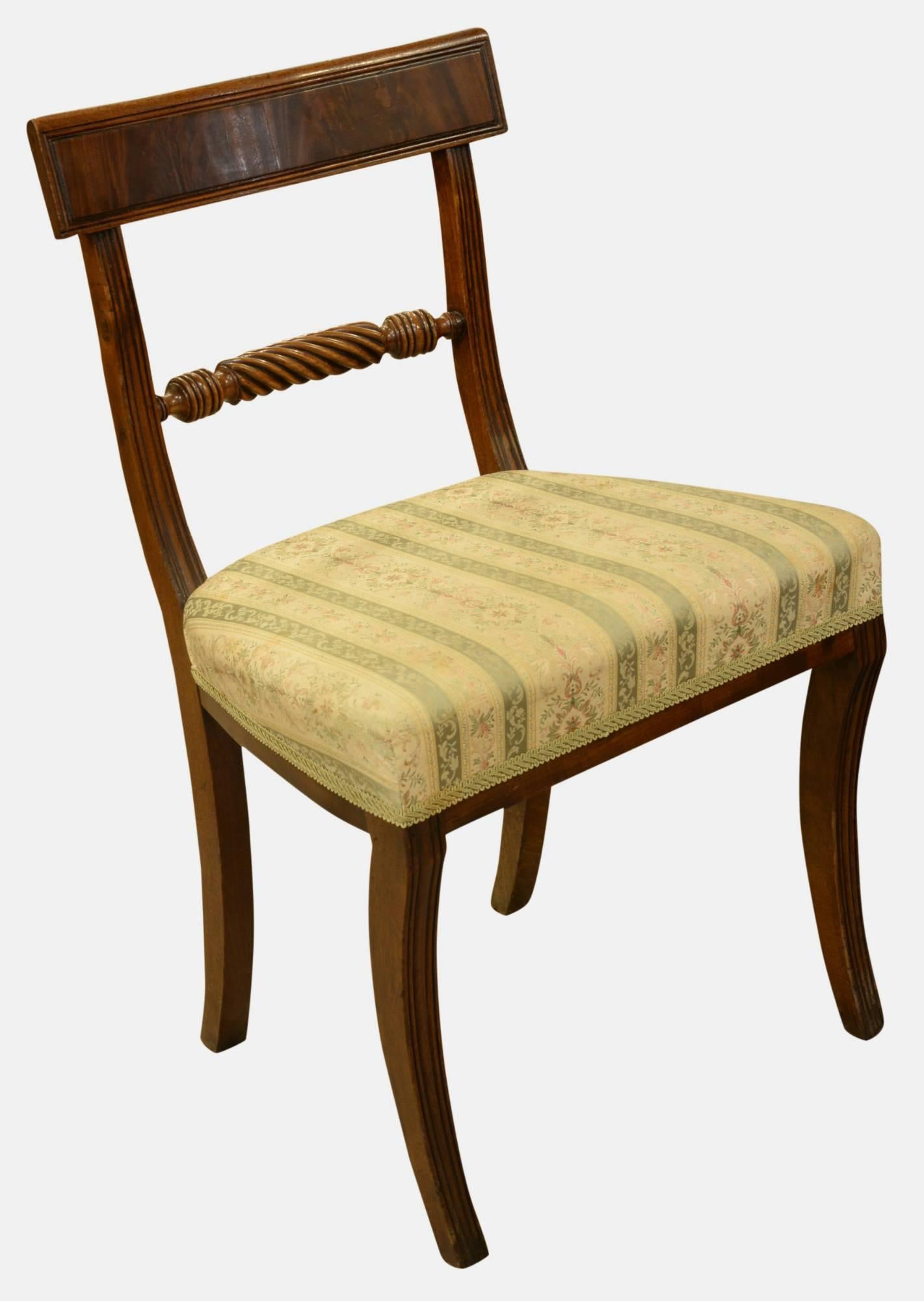 A set of 6 regency period, rope back, sabre leg dining chairs,

circa 1810.