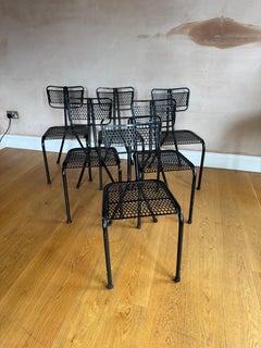 Set of 6 Rene Malaval pierced metal dining chairs