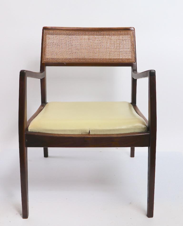 Very chic set of 6 dining chairs designed by Jens Risom. Know as the Playboy chair, this model is quintessential Mid-Century Modern cool, displaying confident modern architectural style while still having just enough Danish warmth to avoid being too