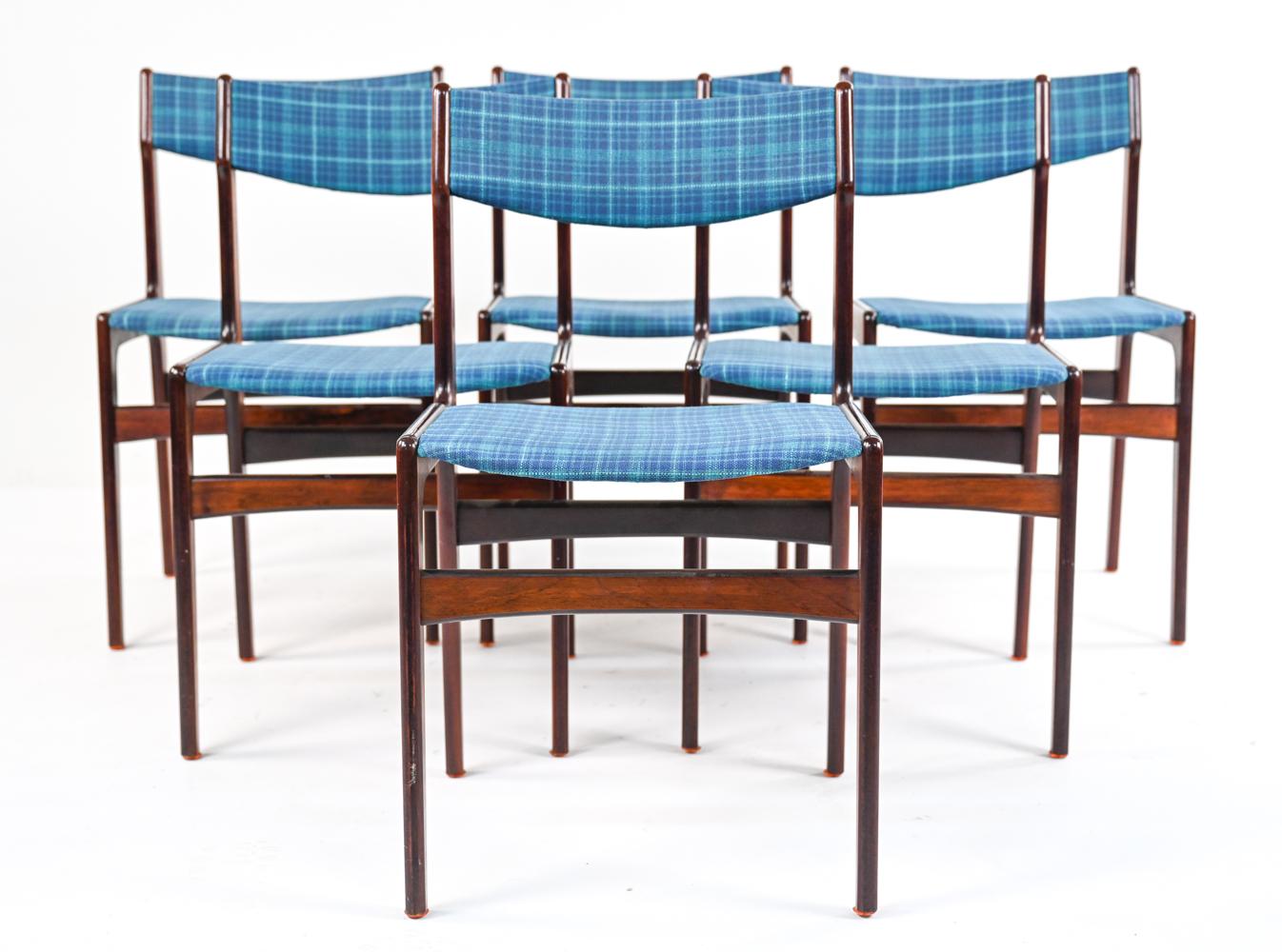 Set of (6) dining side chairs in rare rosewood veneer with period woven plaid upholstery. Designed by Erik Buch; attributed to manufacturer O.D. Mobler.