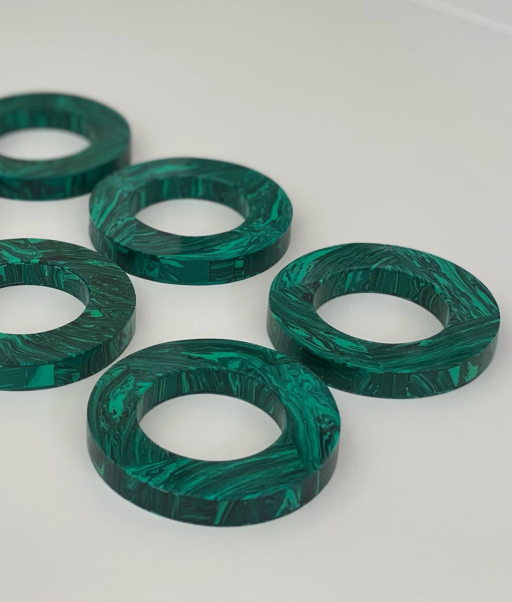 Set of 6 round malachite napkin rings by Marcela Cure
Dimensions: W 7 x D 7 x H 1 cm
Materials: Malachite

Our luxurious Malachite Napkin Rings are completely made with natural malachite. They are the perfect finishing touch for a beautiful