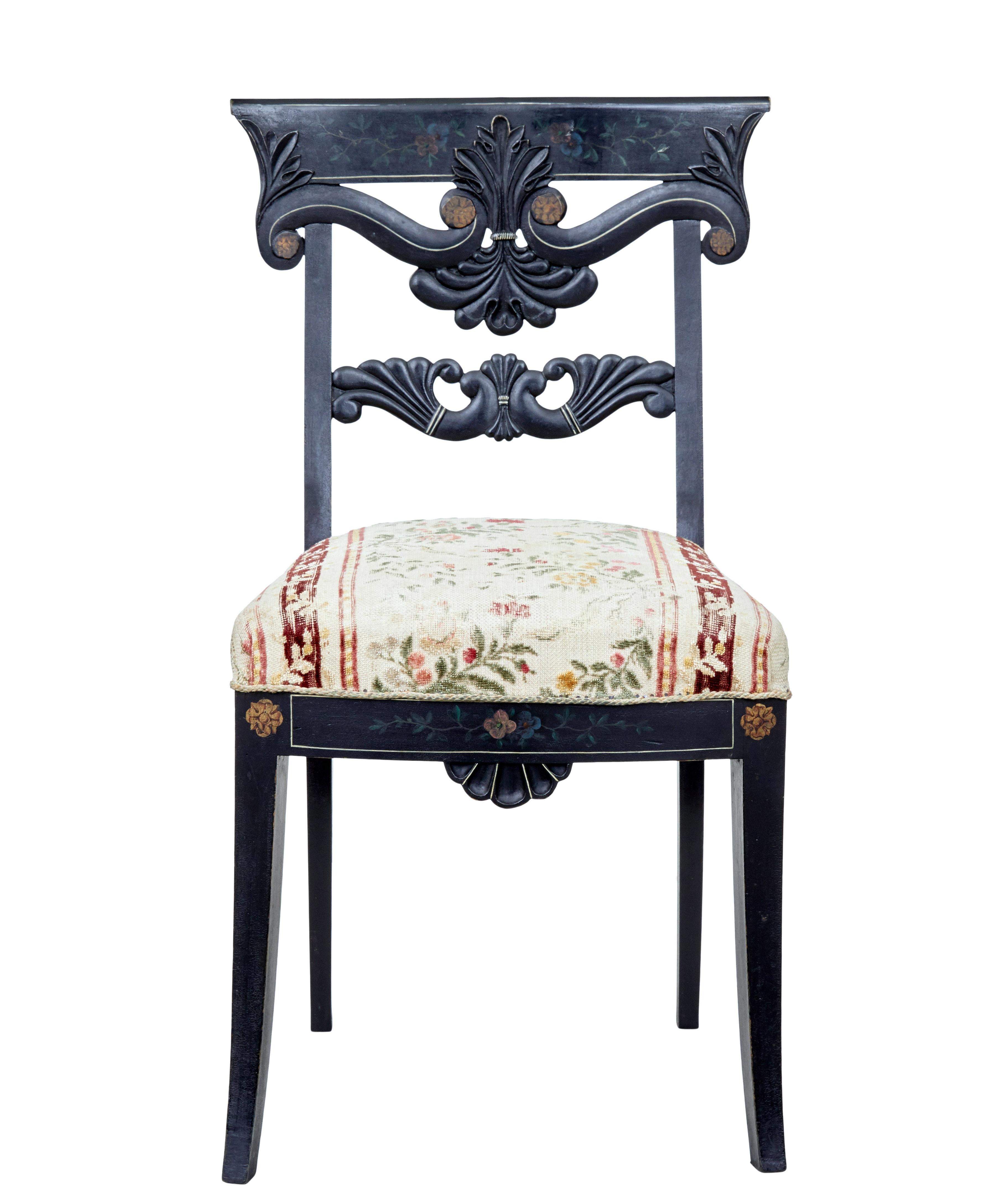 Set of 6 Scandinavian carved and hand painted dining chairs, circa 1890.

Fine set of chairs made from solid beech, painted black with hand painted elements to the backrest and front rail. Carved scrolling backrest and shell detail to front