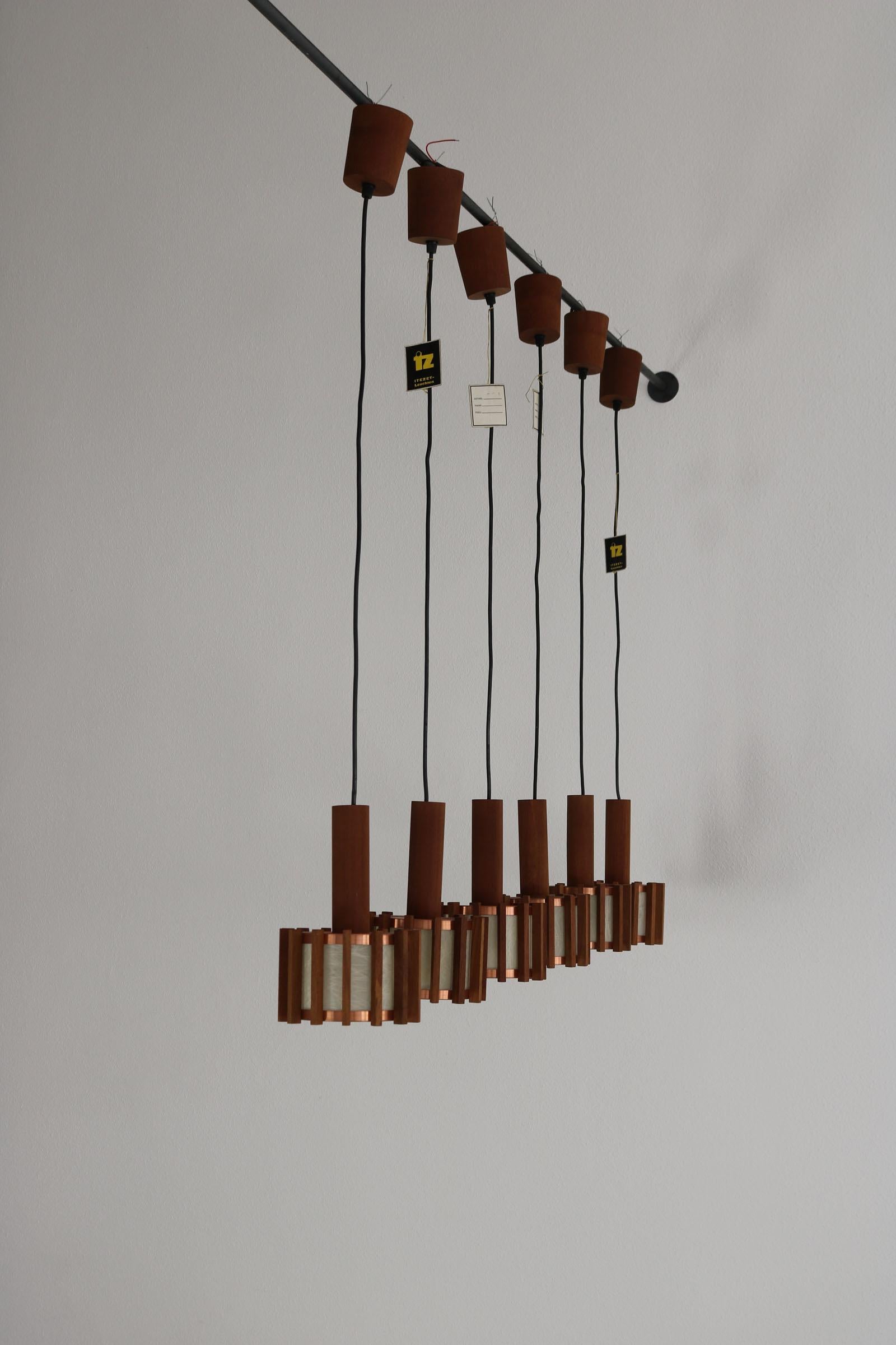 Set of 6 Scandinavian mid-century ceiling lamps made of teak & copper For Sale 5