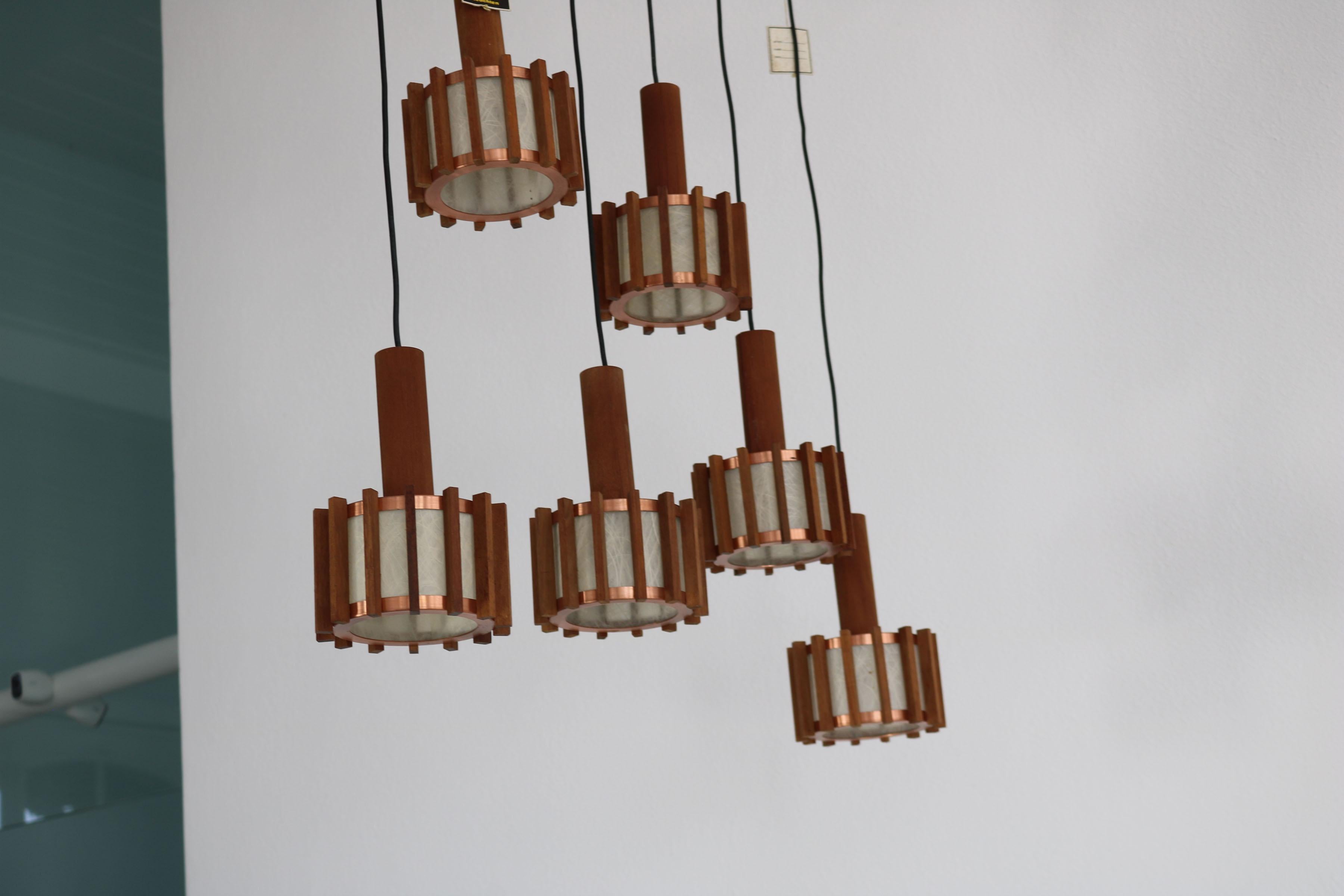 Danish Set of 6 Scandinavian mid-century ceiling lamps made of teak & copper For Sale