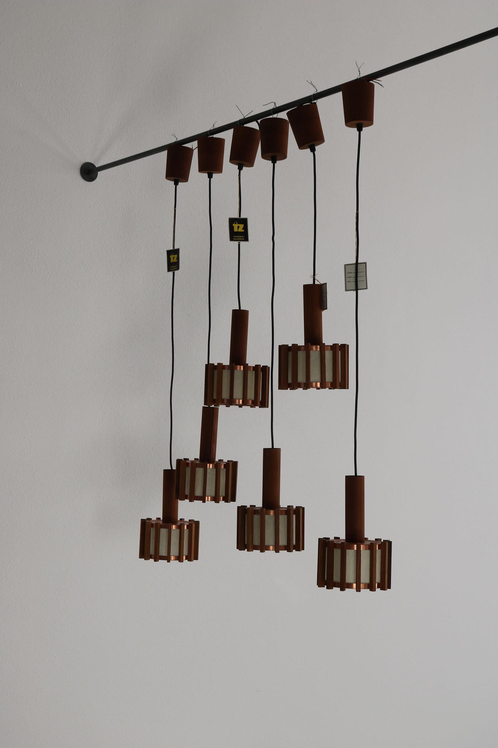 Mid-20th Century Set of 6 Scandinavian mid-century ceiling lamps made of teak & copper For Sale