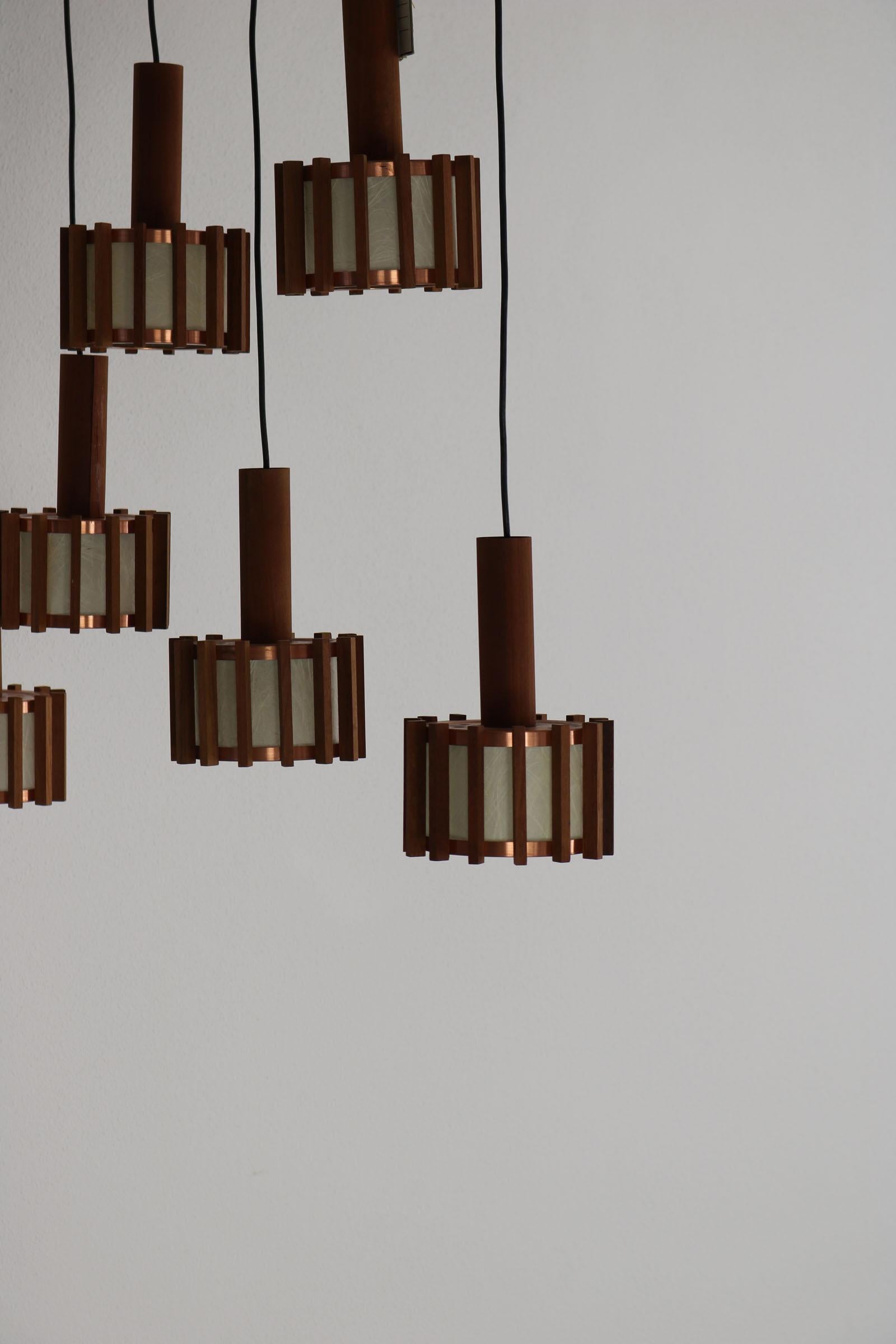 Set of 6 Scandinavian mid-century ceiling lamps made of teak & copper For Sale 1