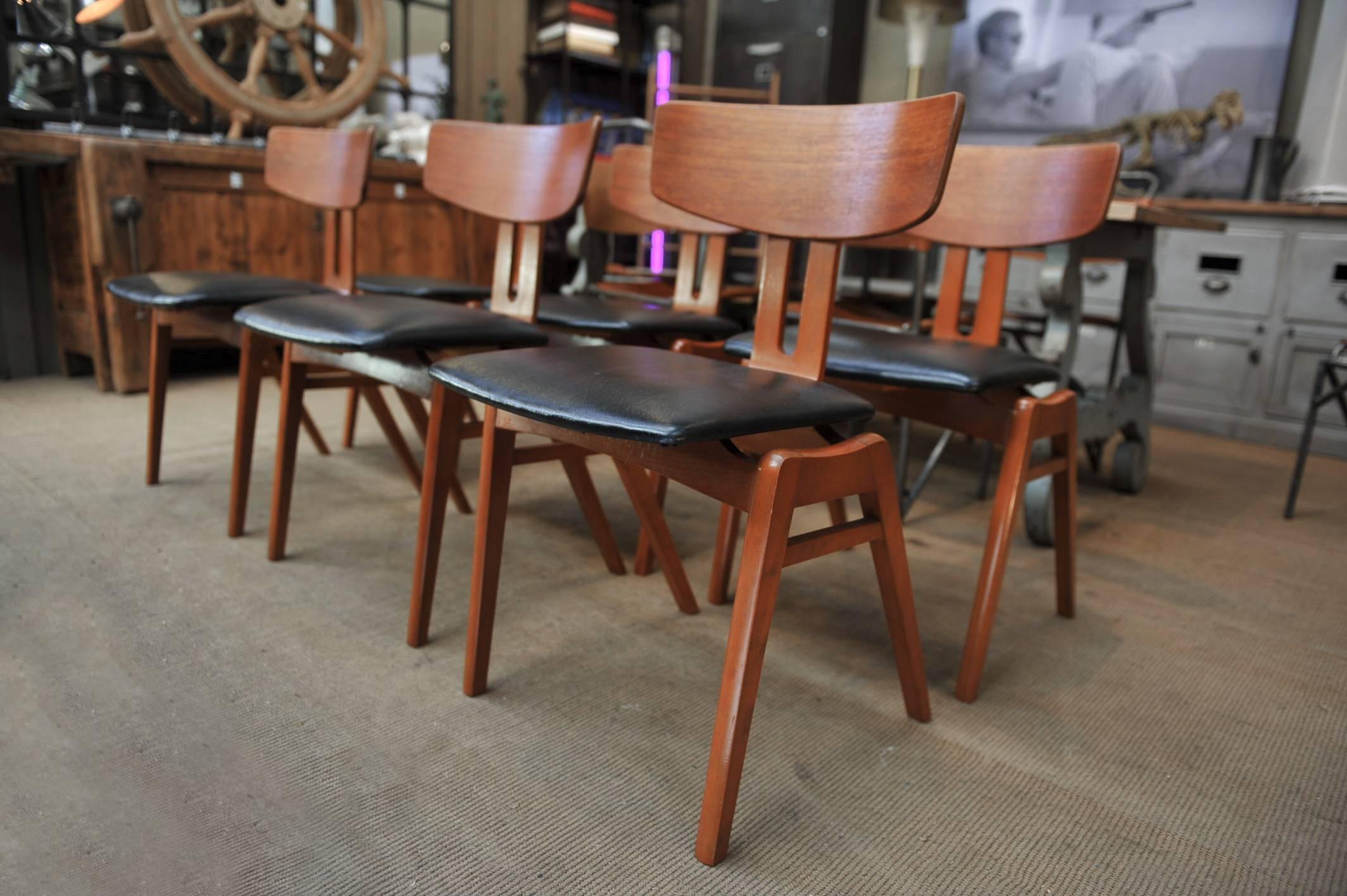 Set of six Scandinavian great shape teak and faux leather chairs, circa 1960 all in excellent condition and very stabile. Measure: Height seat 46 cm.