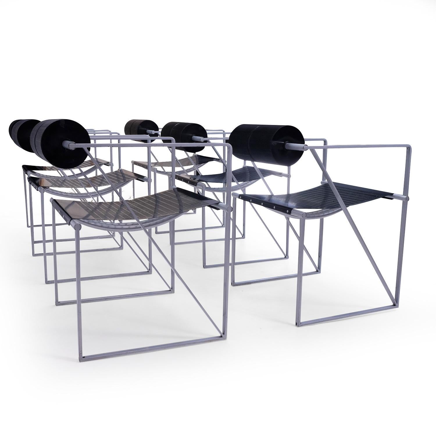 Set of 6 vintage Seconda chairs by Mario Botta for Alias, 1980s

The Seconda chair (1982) is an iconic piece of design, with use of materials that are typical for Botta’s furniture and lamps: Sheet metal, metal tubing, plastic and rubber. The