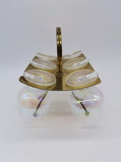 Set of 6 shot glasses in brass holder