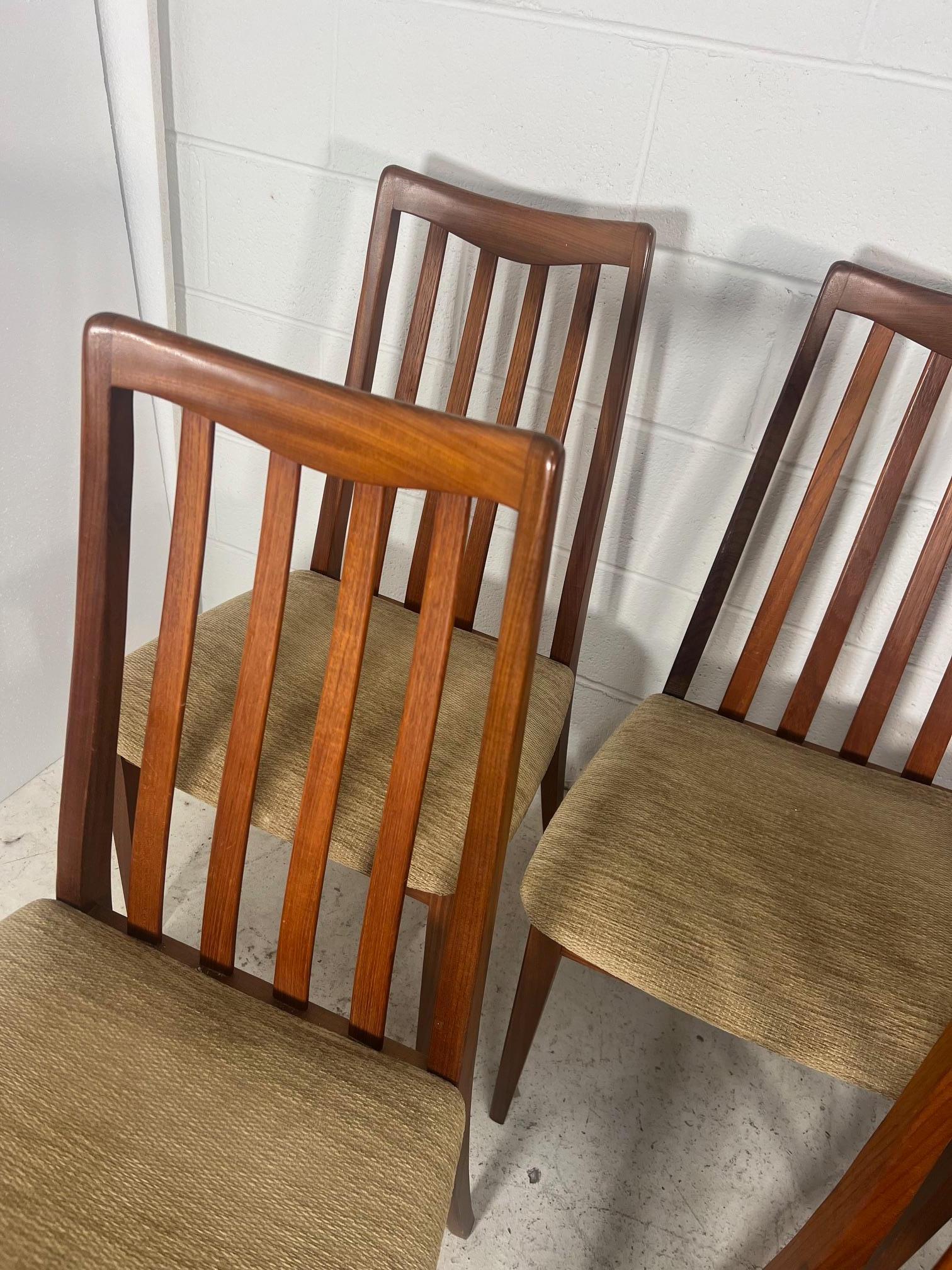 Set of 6 mid century modern teak dining chairs by G Plan.

Very good condition. Some marks on the frames as shown in photos but very nice overall. Upholstery seems to be original. Some of the chairs still have the original G Plan sticker