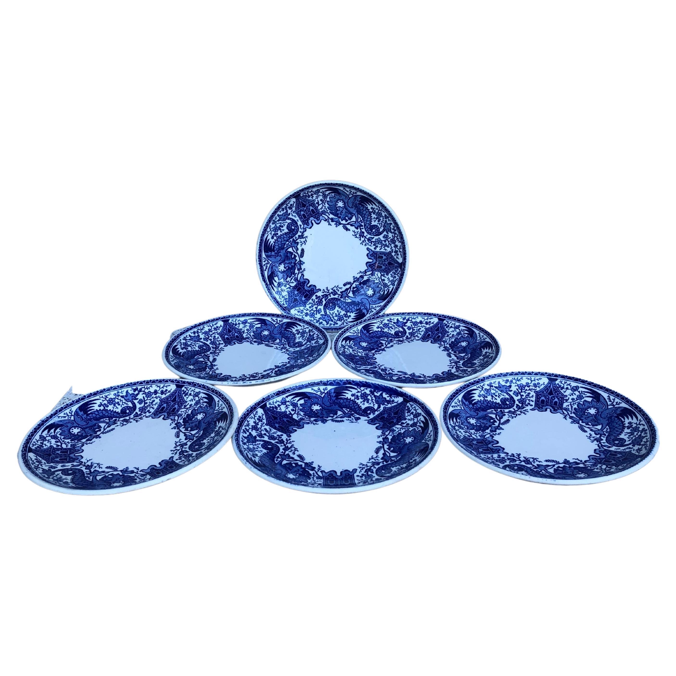 Set of 6 small blue & white small plates dragons signed Sarreguemines.
Measure: 6 inches diameter.